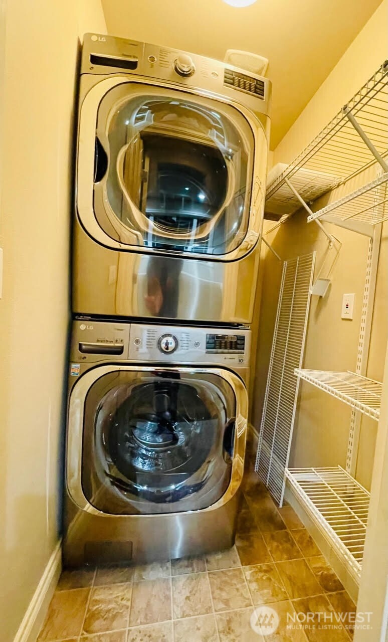 Utility Room with Large Capacity SS Washer/Dryer Unit