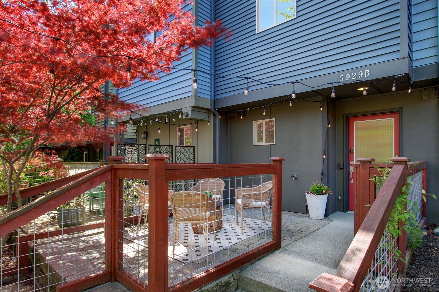 This outdoor space is a luxury in a townhome, and is ready for summer hangs!
