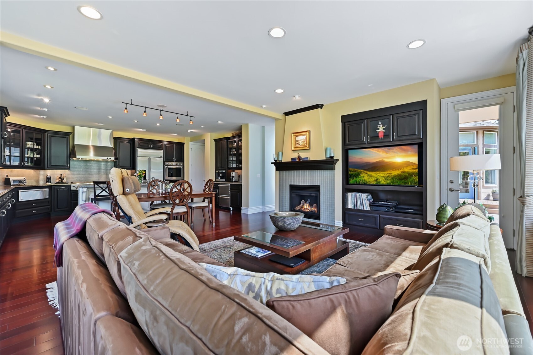Built-in media cabinet includes the TV.