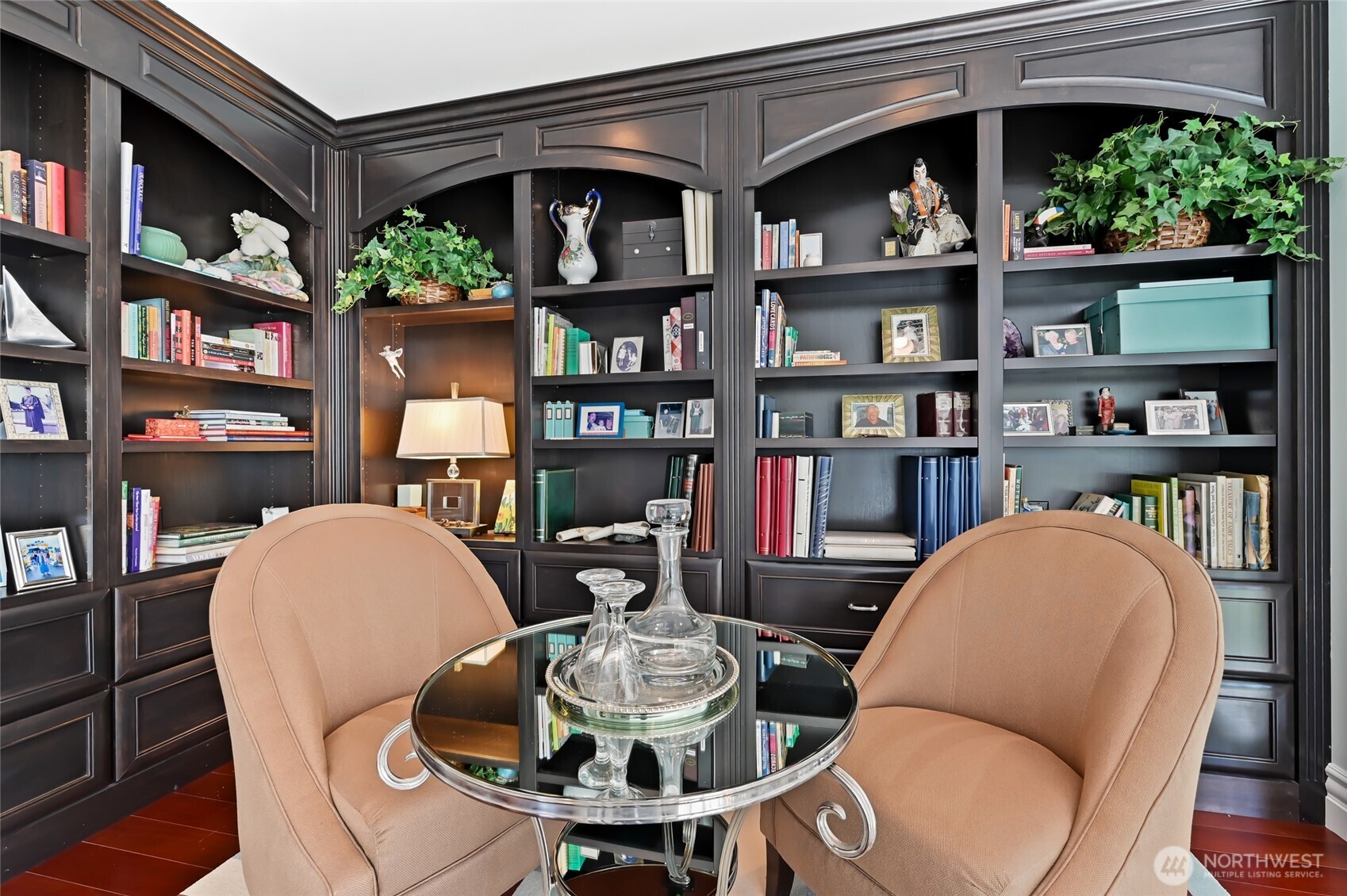 At the top of the stairs you'll find the library nook with floor to ceiling bookcases.
