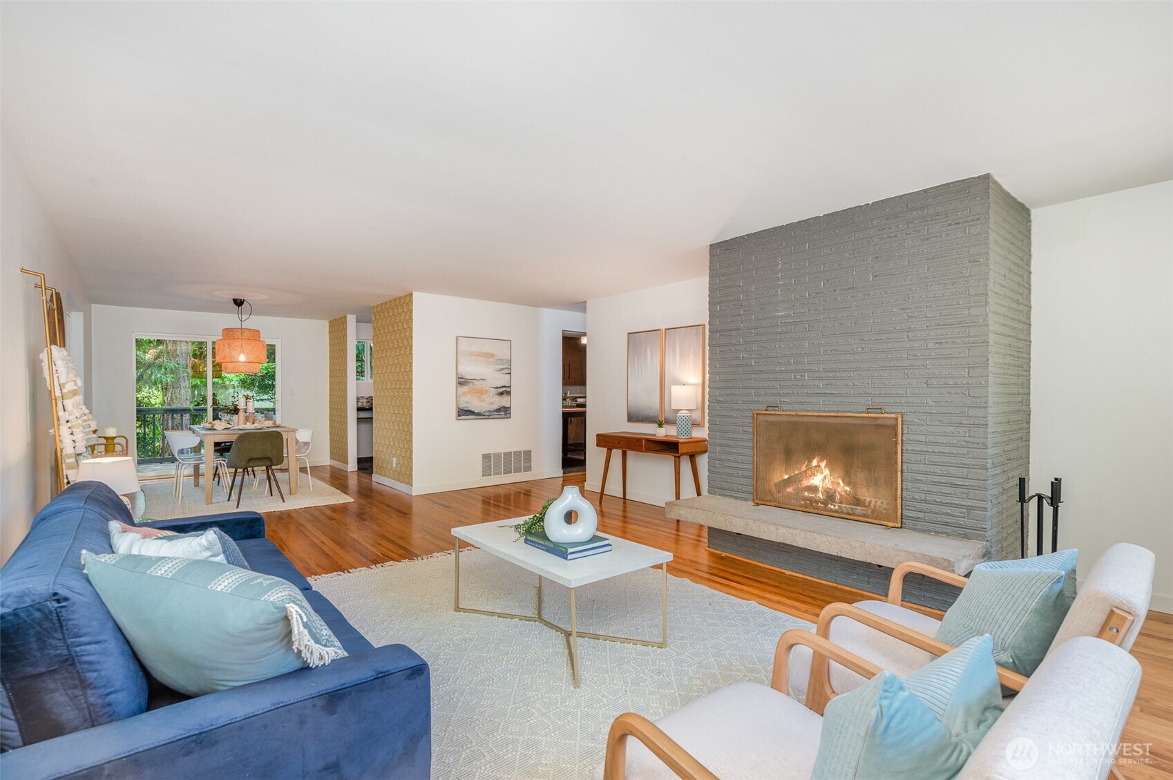 Main floor living room with hardwood floors and MCM charm