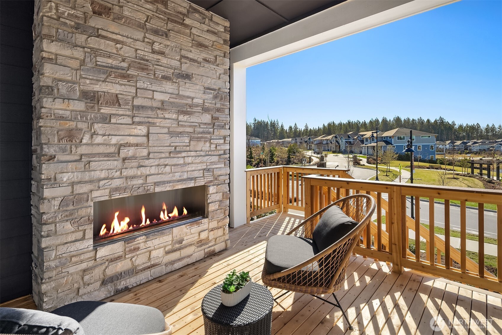 Covered deck with exterior fireplace - gorgeous southwest facing  Photos for illustrative purposes