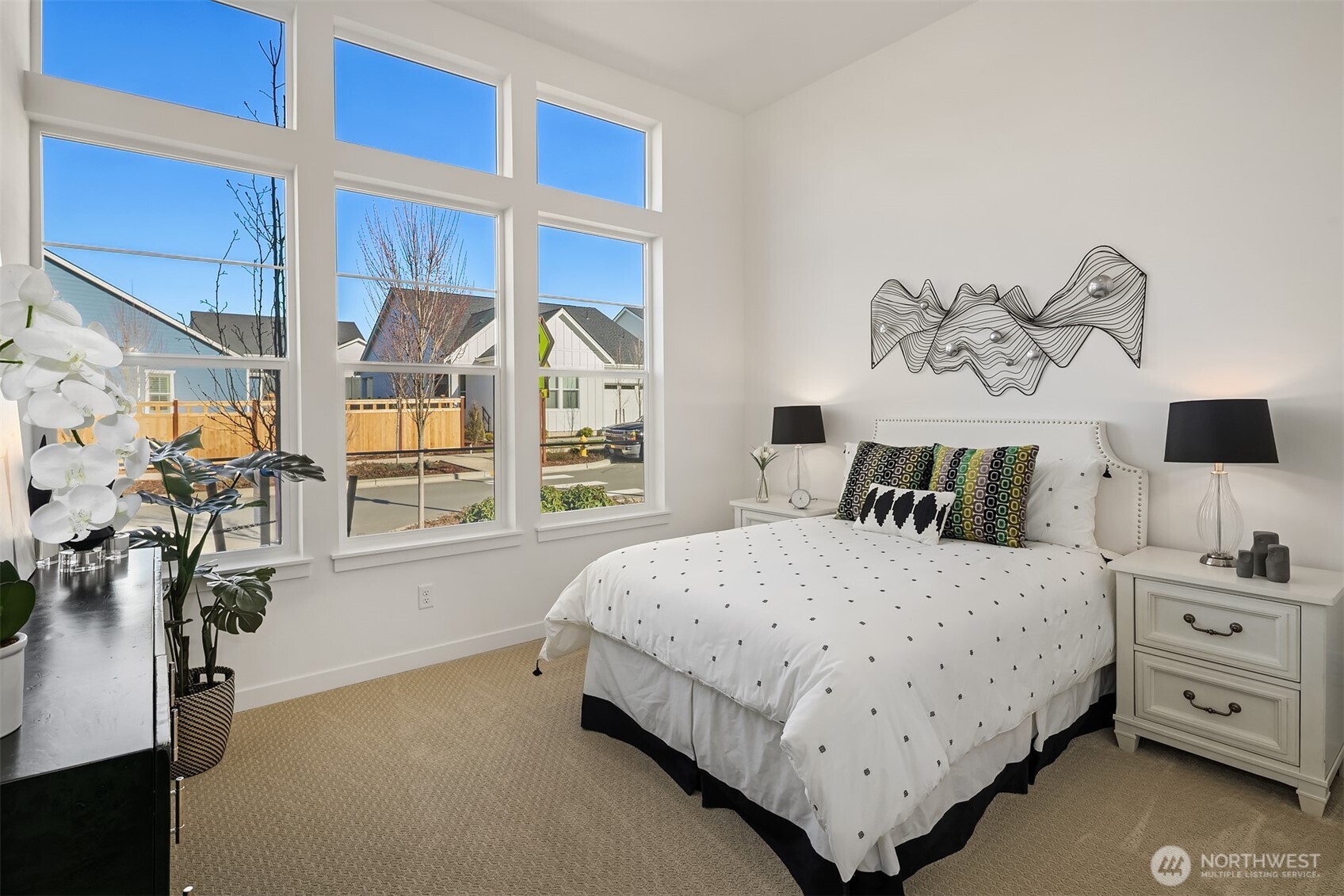 Guest Bedroom with 12 foot ceiling height, extra windows  Photos for illustrative purposes