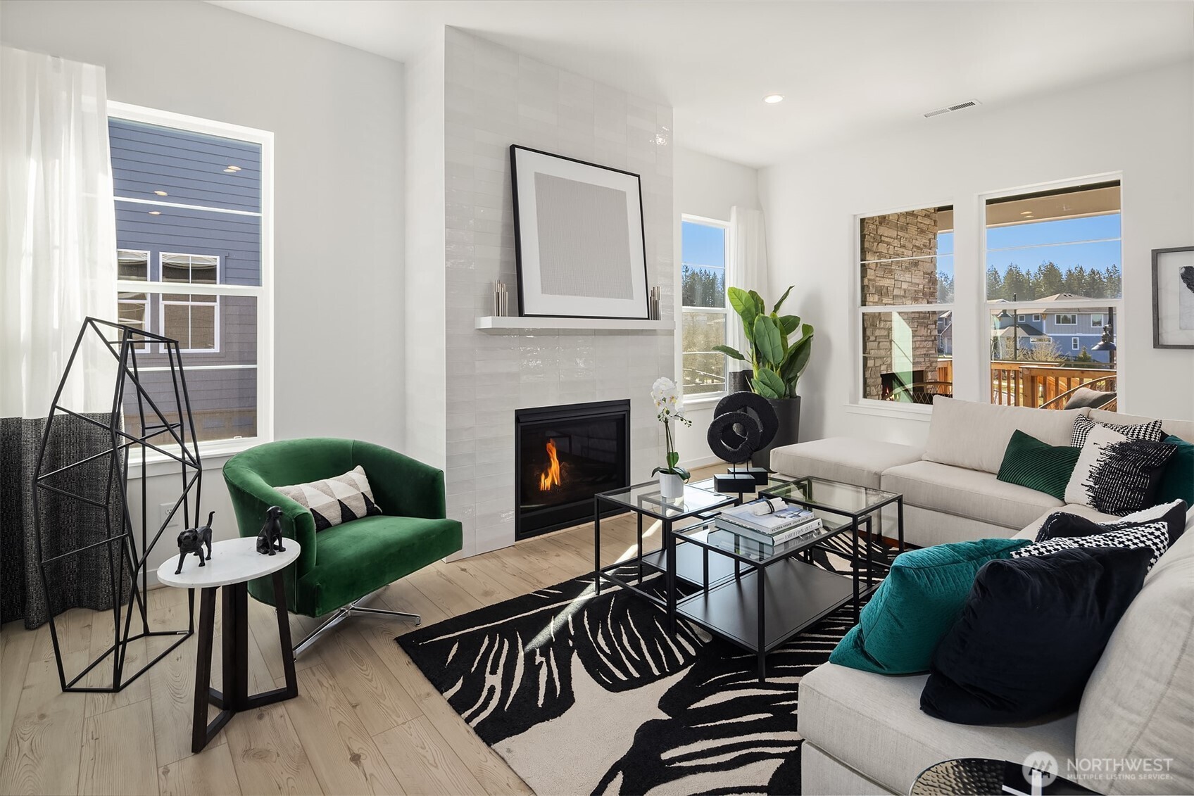 Great room with fireplace Photos for illustrative purposes