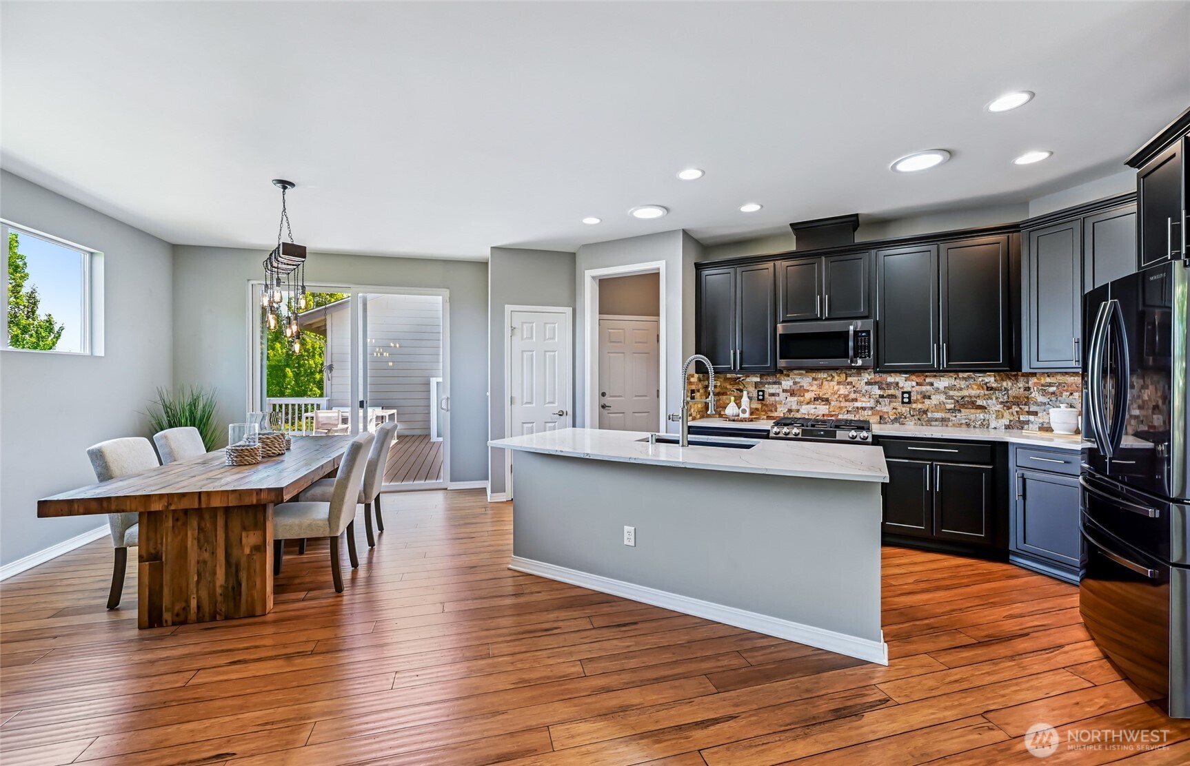 The dining area easily accommodates 8 people and is a great spot for game nights or special occasion dinners. Add a couple of bar stools to the counter for more casual dining.