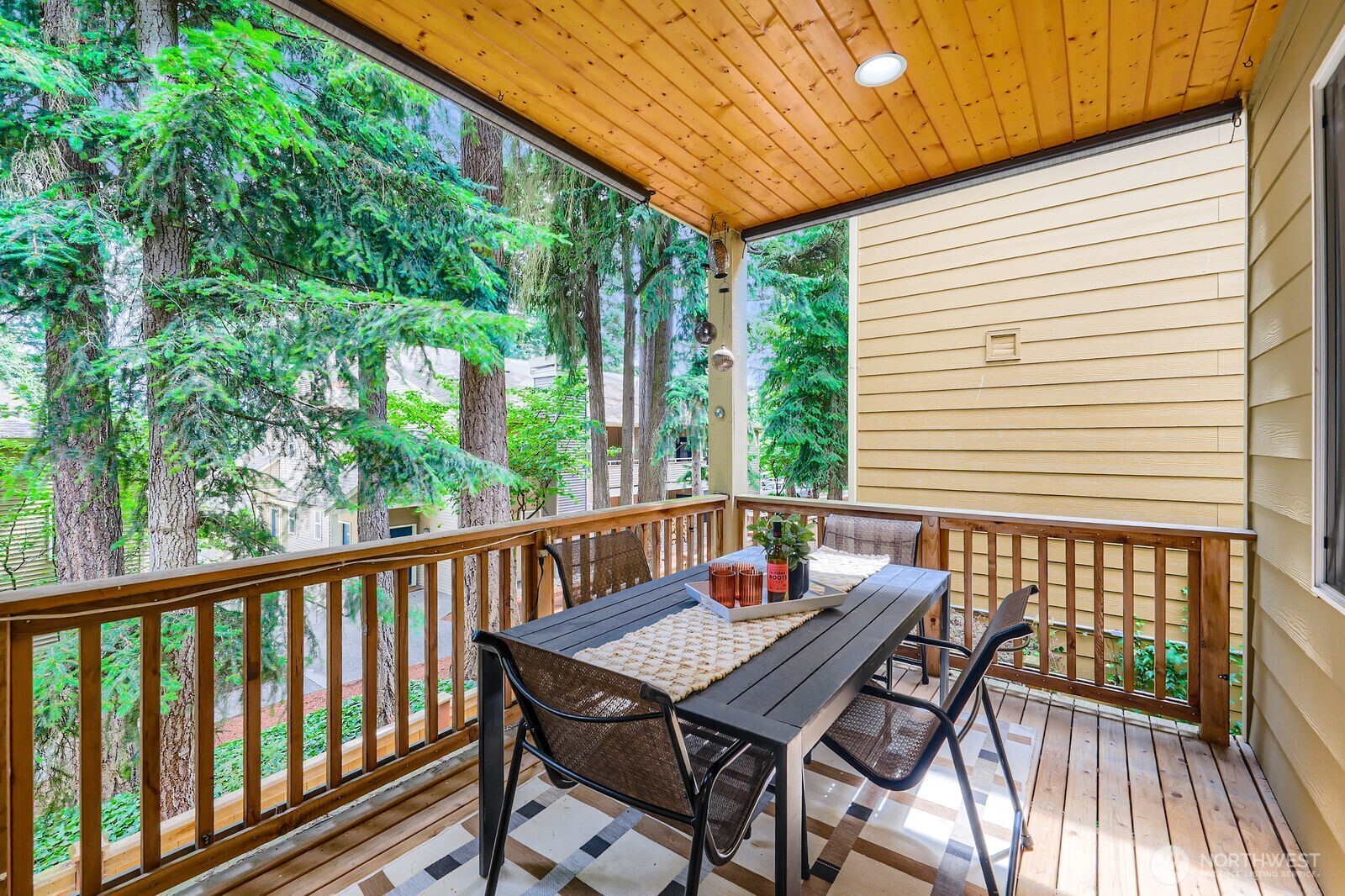 Covered deck off dining area is allows for year-round entertaining and outdoor dining.