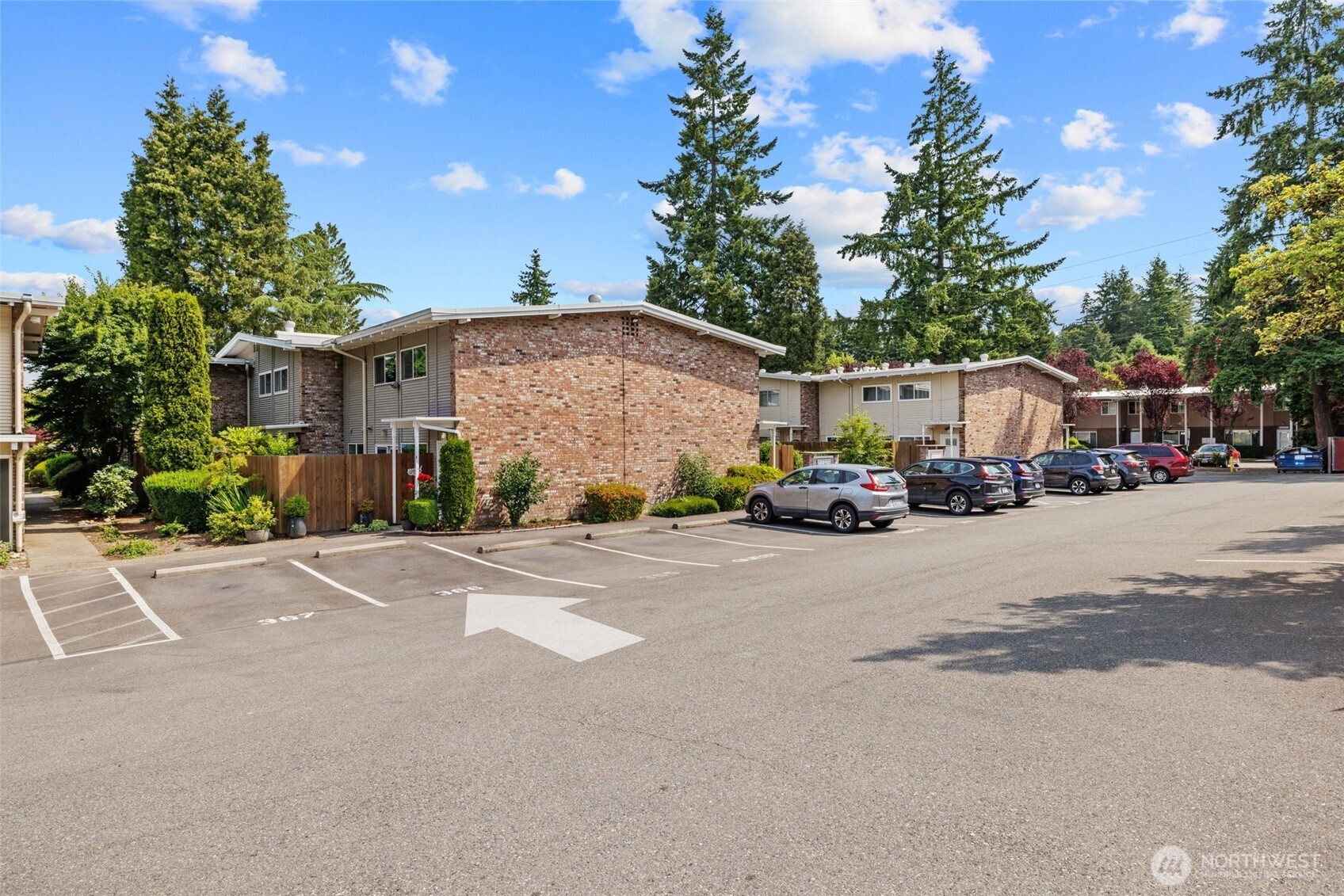 A charming entryway welcomes you to this beautifully updated townhome, nestled in a quiet and well-maintained community.