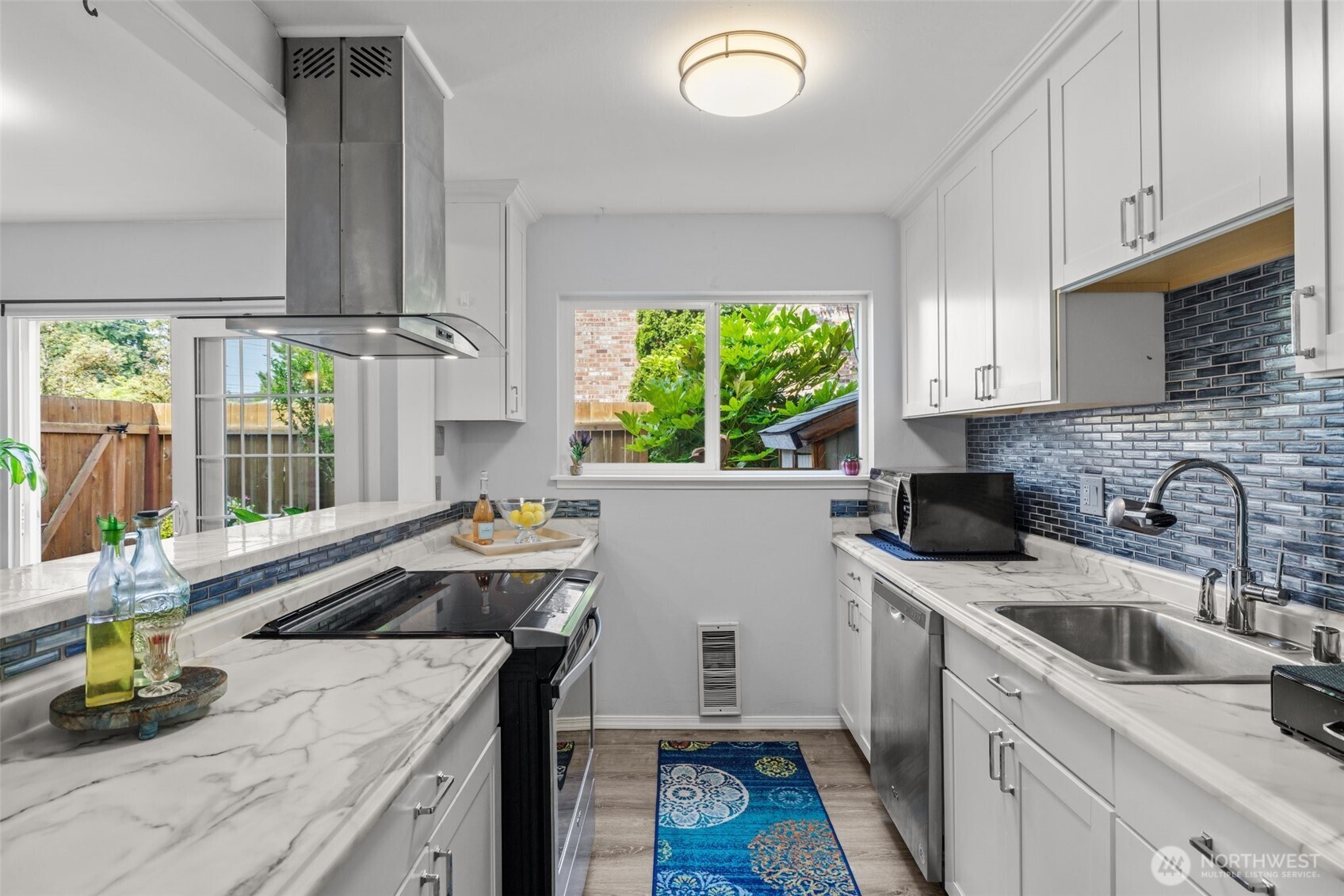 With plenty of counter space and an open design, this kitchen makes both cooking and hosting a breeze.