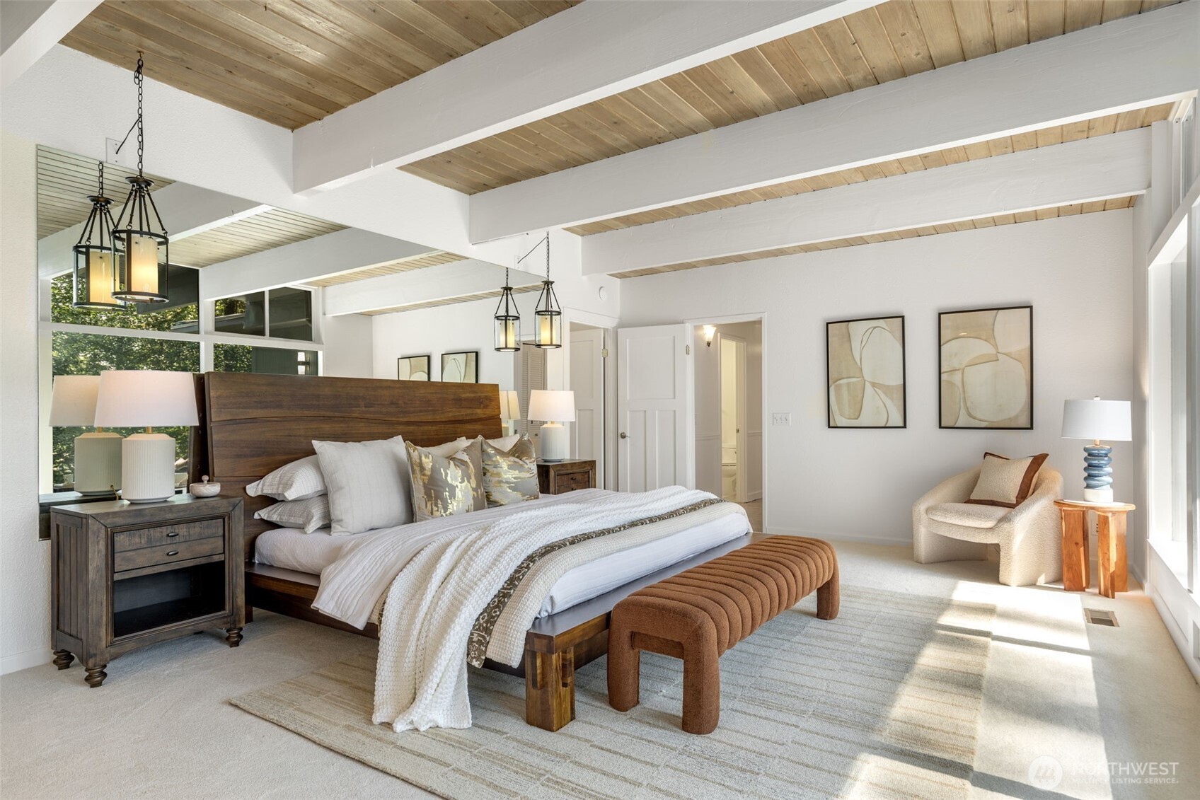 Resort-style living with abundant natural sunlight reflecting on floors and ceilings