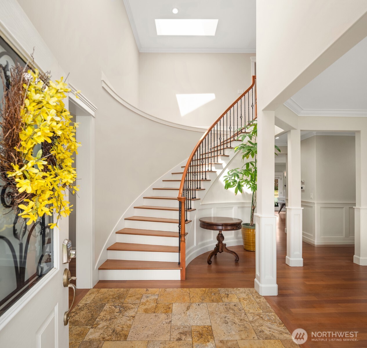 Grand entry with your formal living to the left and your dining room to the right
