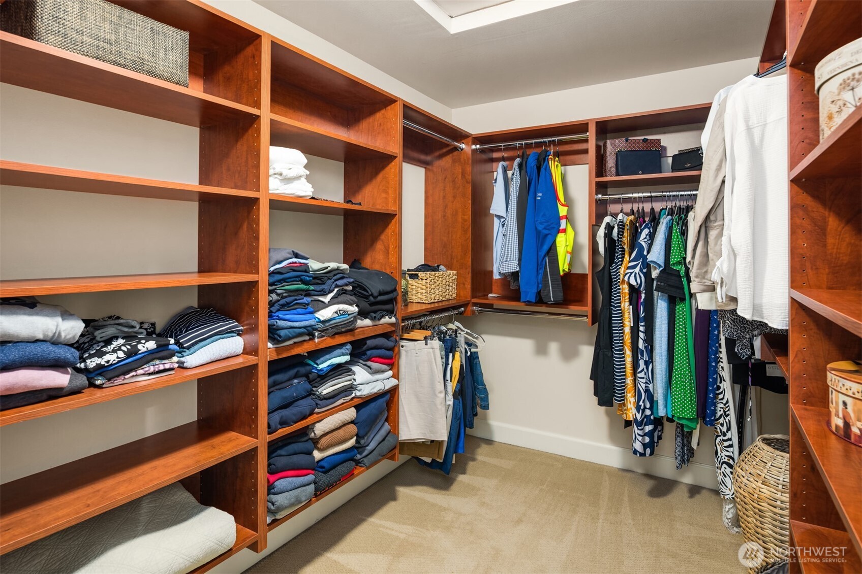 2nd floor primary bedroom walk-in closet with built-ins