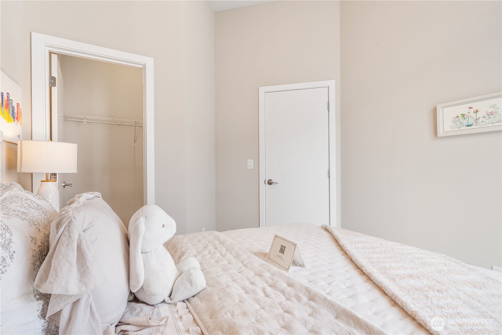 Bedroom 1 with a walk-in closet
