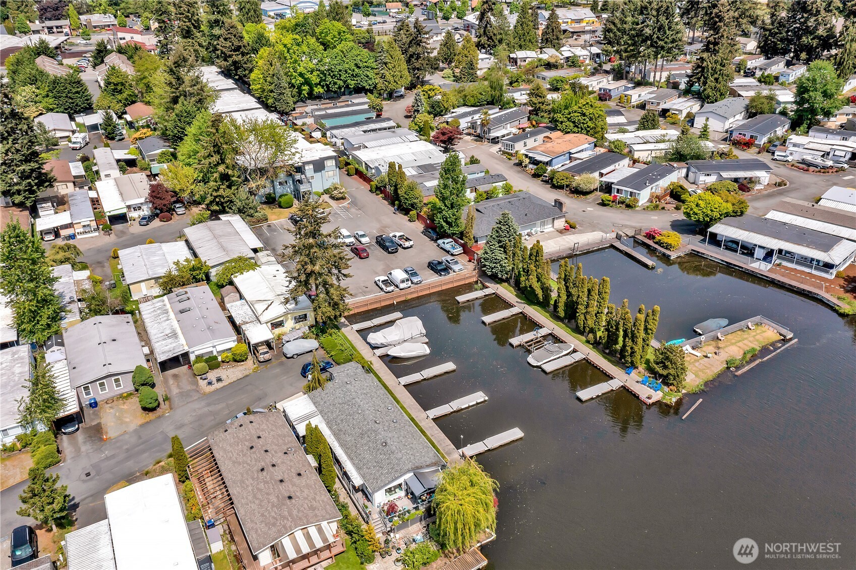 Aerial view of the waterfront and Condo Building