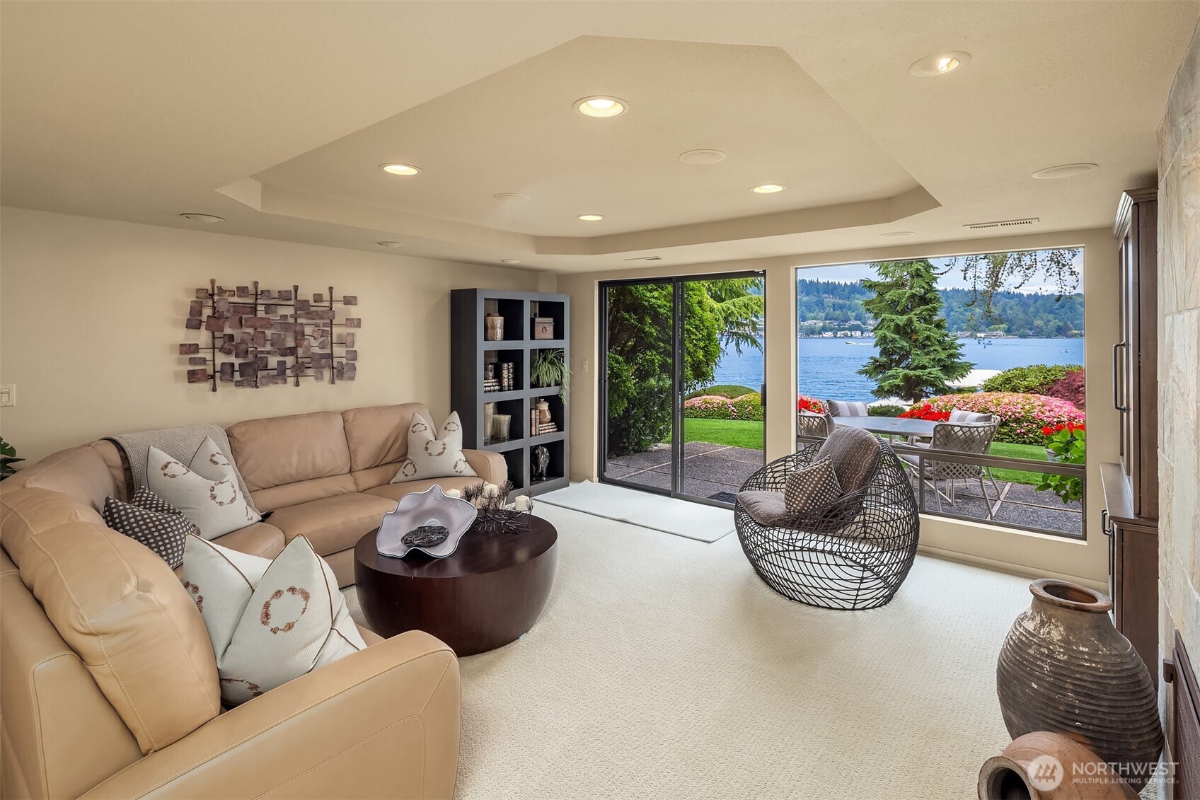 Step Out to the Lake from the Rec Room with Fireplace + Wet Bar