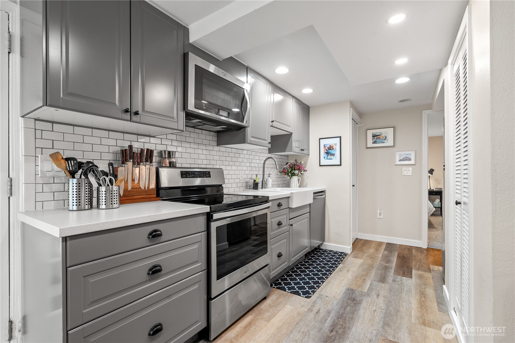 Full kitchen with stainless steel appliances