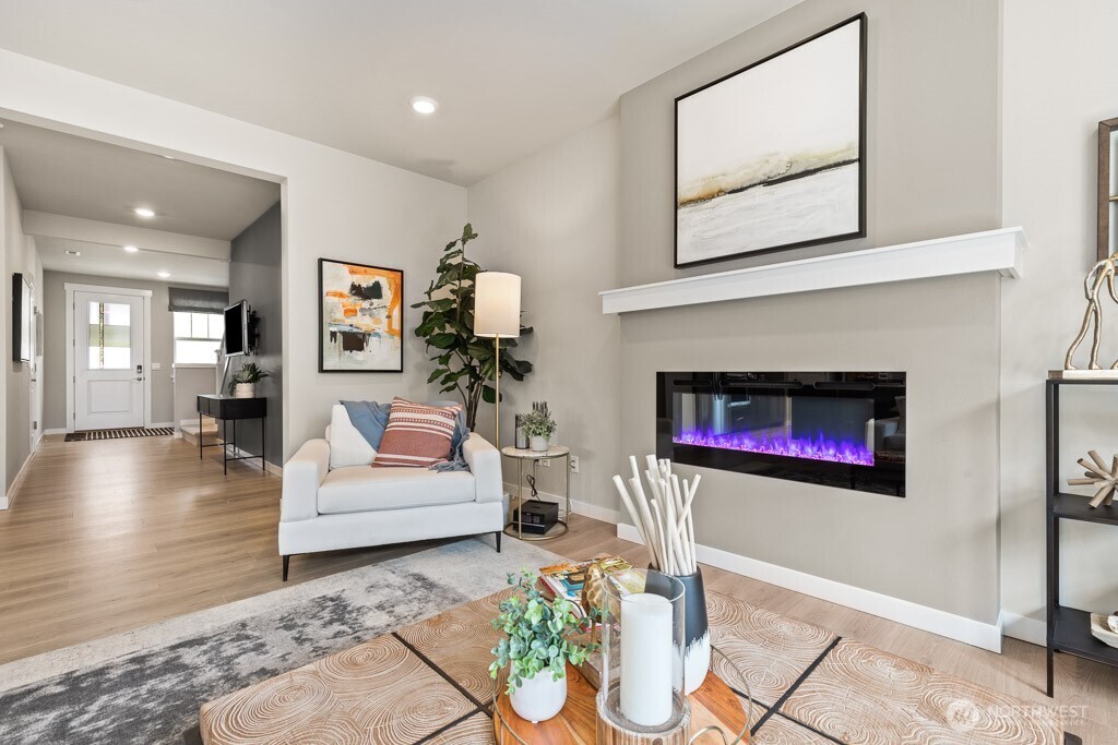 Looking out the front hallway from the family room. Photos are representational. Actual colors and finishes will vary. See site agent for details.