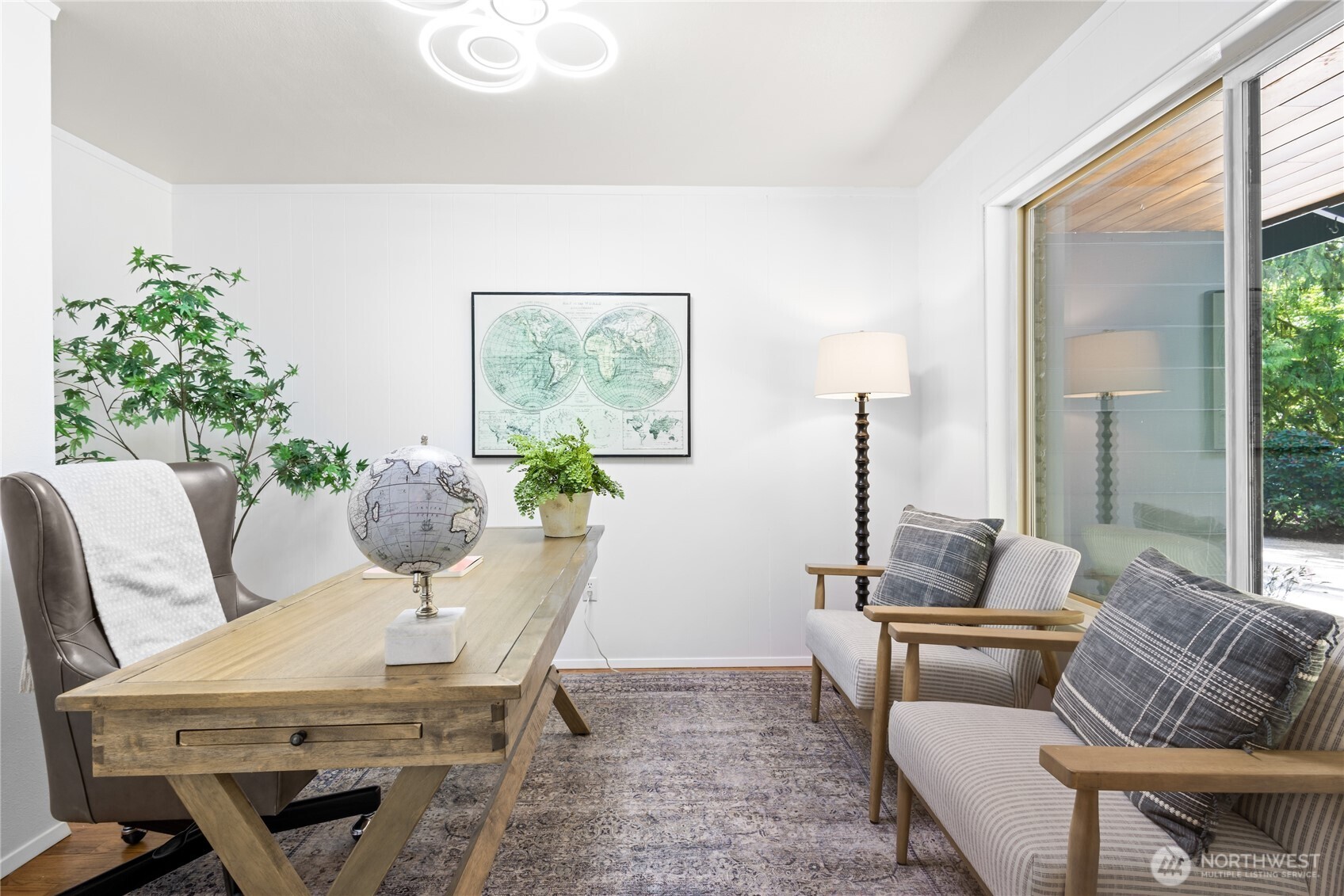 Main floor office with views overlooking the front yard.