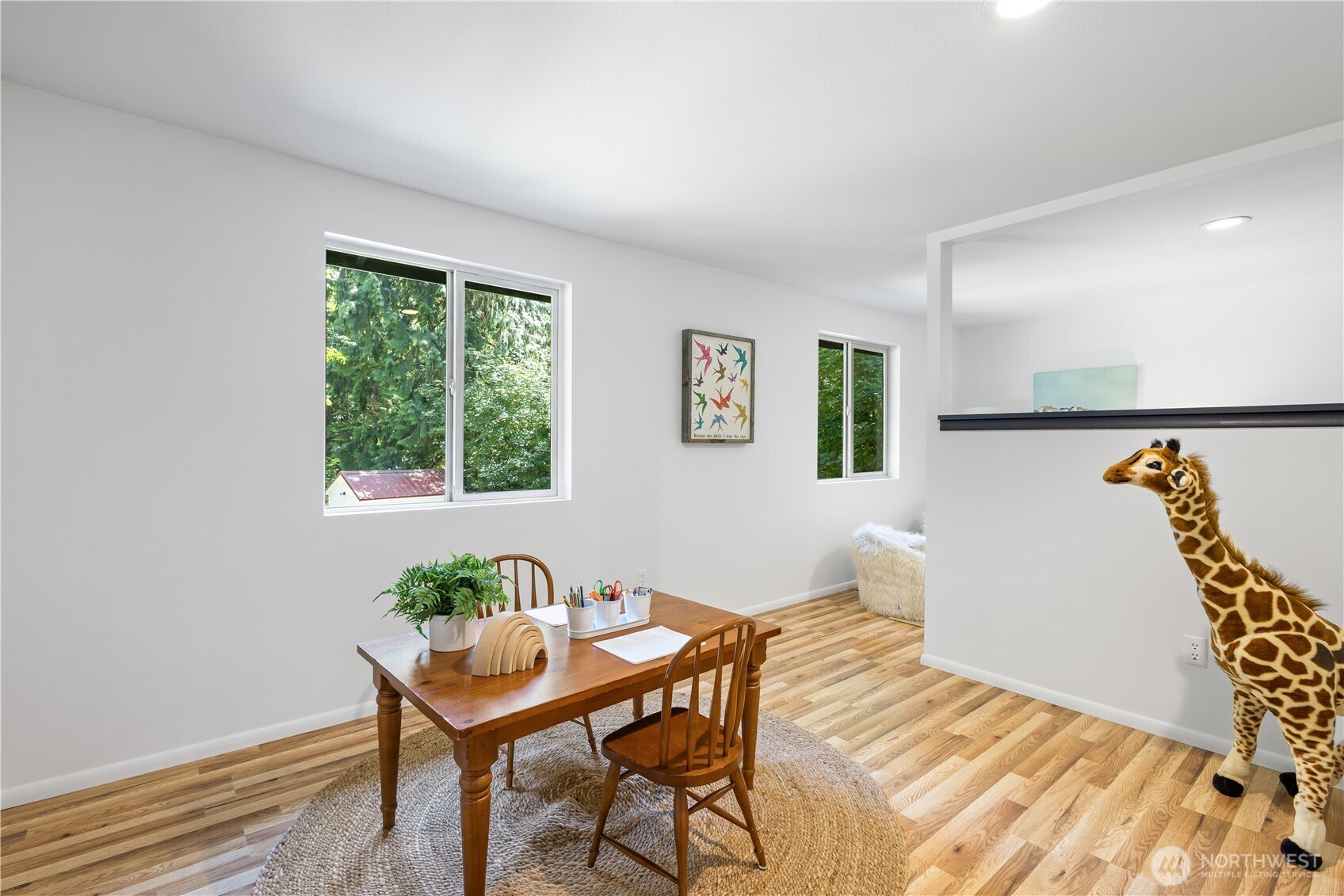 One of two versatile flex rooms that provide ample space for guests, hobbies or extra sleeping quarters. This one is set up as a kids room with attached play area.