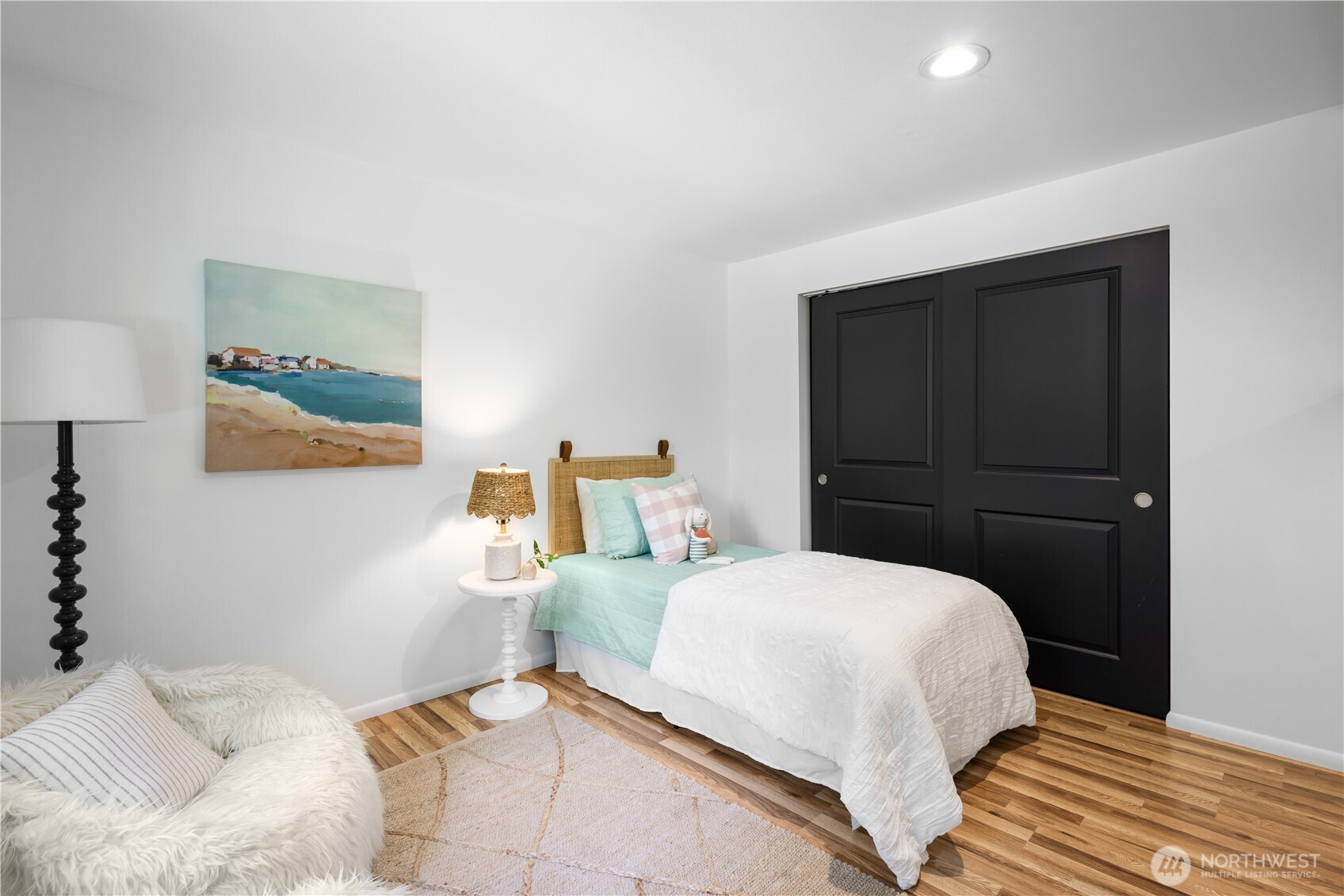 One of two versatile flex rooms that provide ample space for guests, hobbies or extra sleeping quarters. This one is set up as a kids room with attached play area.