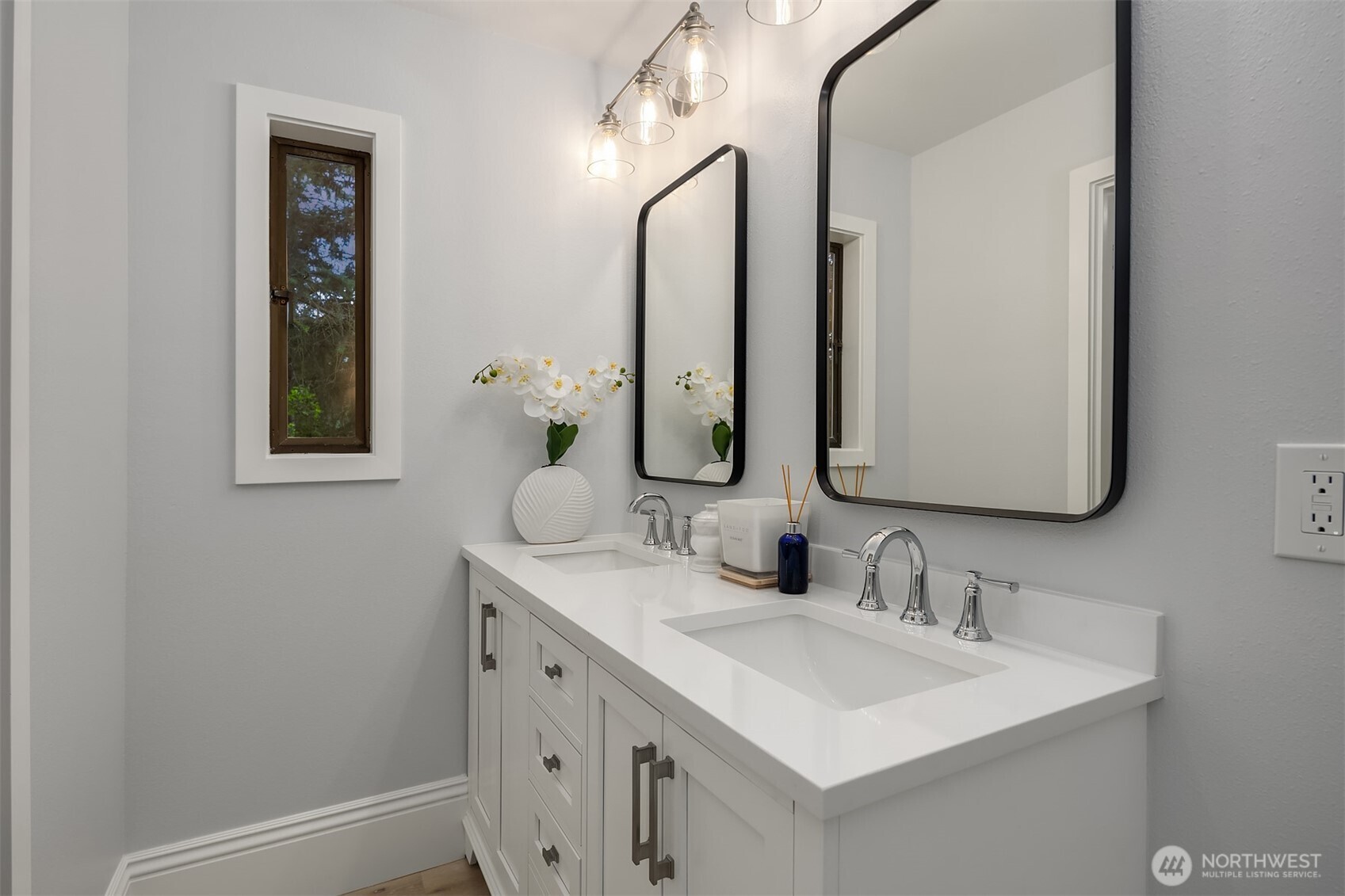 Double vanity off of the primary walk-in closet