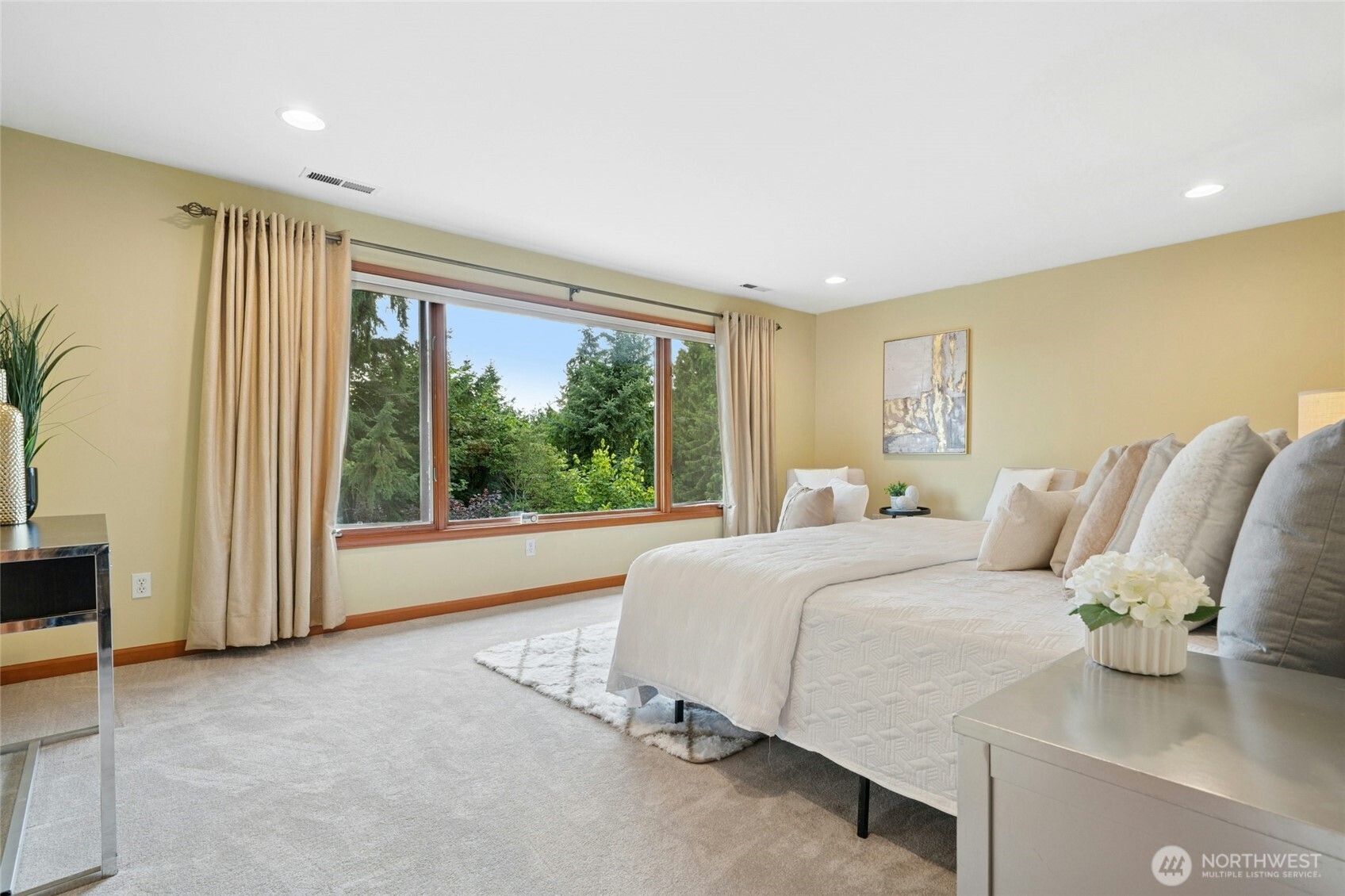 Primary Suite with territorial views. Always facing lush green trees