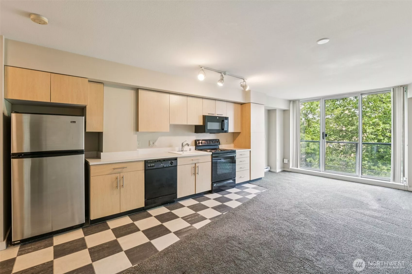 Discover your peaceful escape in the city—an urban retreat with a private, tree-lined view nestled in vibrant downtown Bellevue.