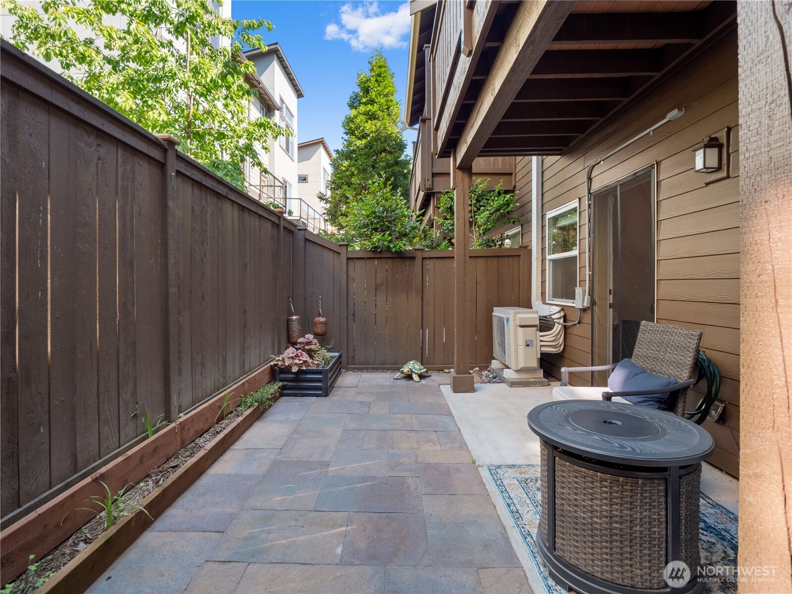 Private, paved patio for outdoor enjoyment.