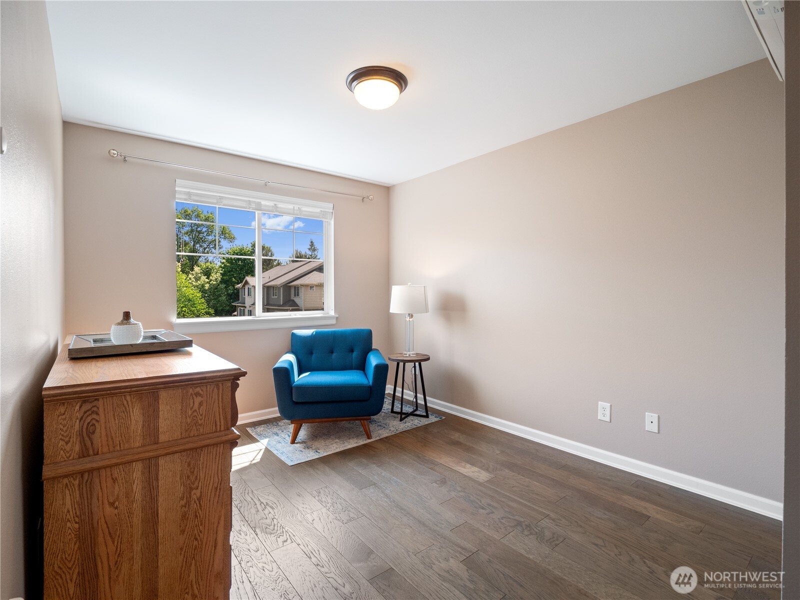 The third bedroom upstairs is flexible and awaits your personal touch.