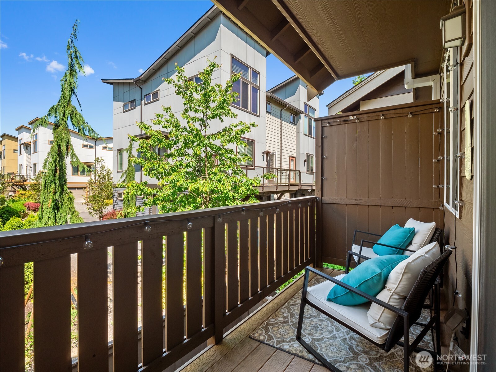 Step outside and enjoy your private balcony, offering a pleasant outdoor retreat and views of the surrounding community.