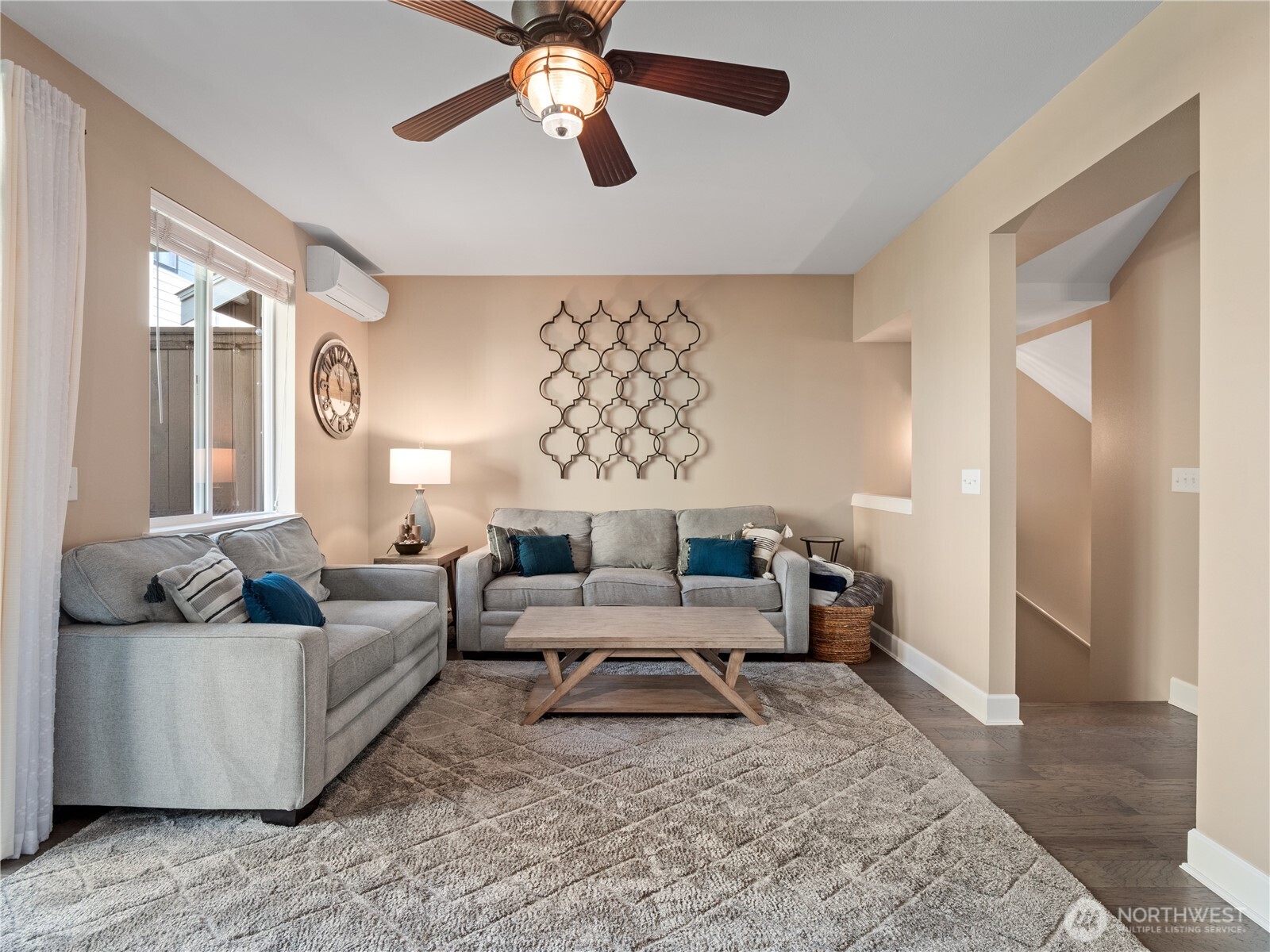 Step into this bright and stylish living room, where comfort meets elegance.