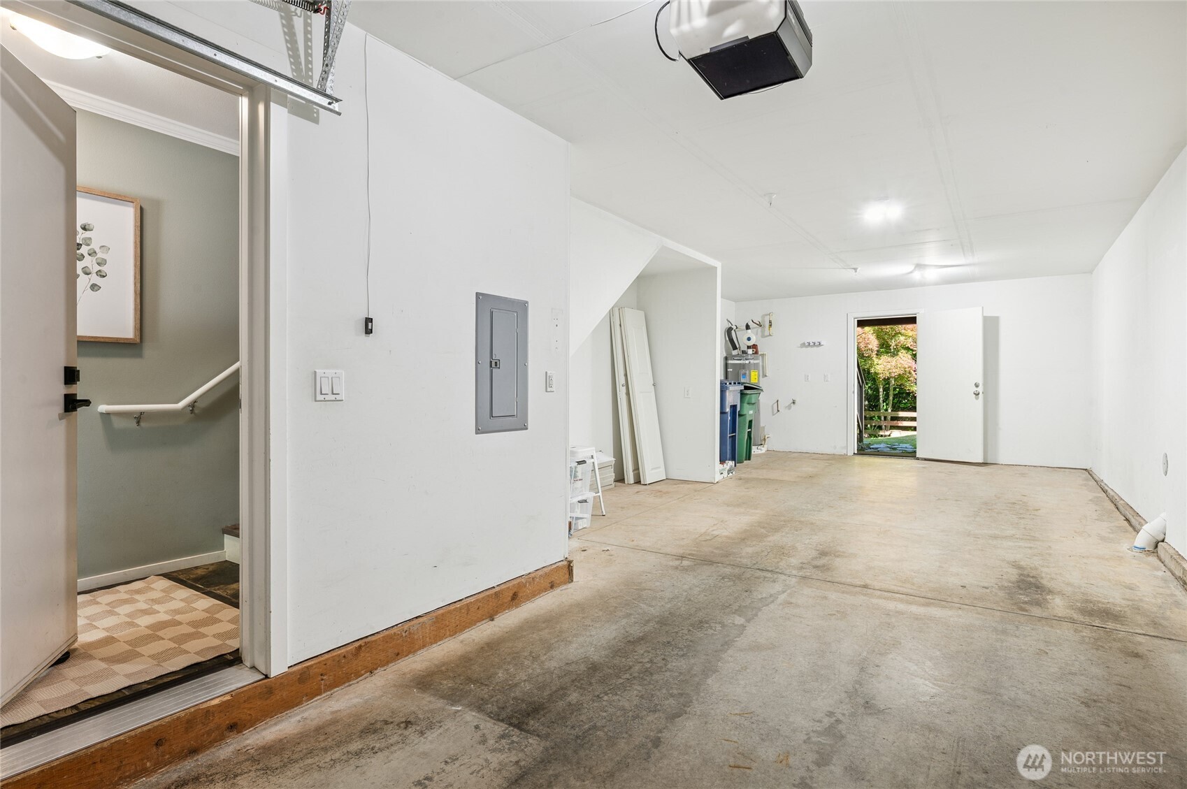 Spacious tandem 2-car garage with extra room for storage.