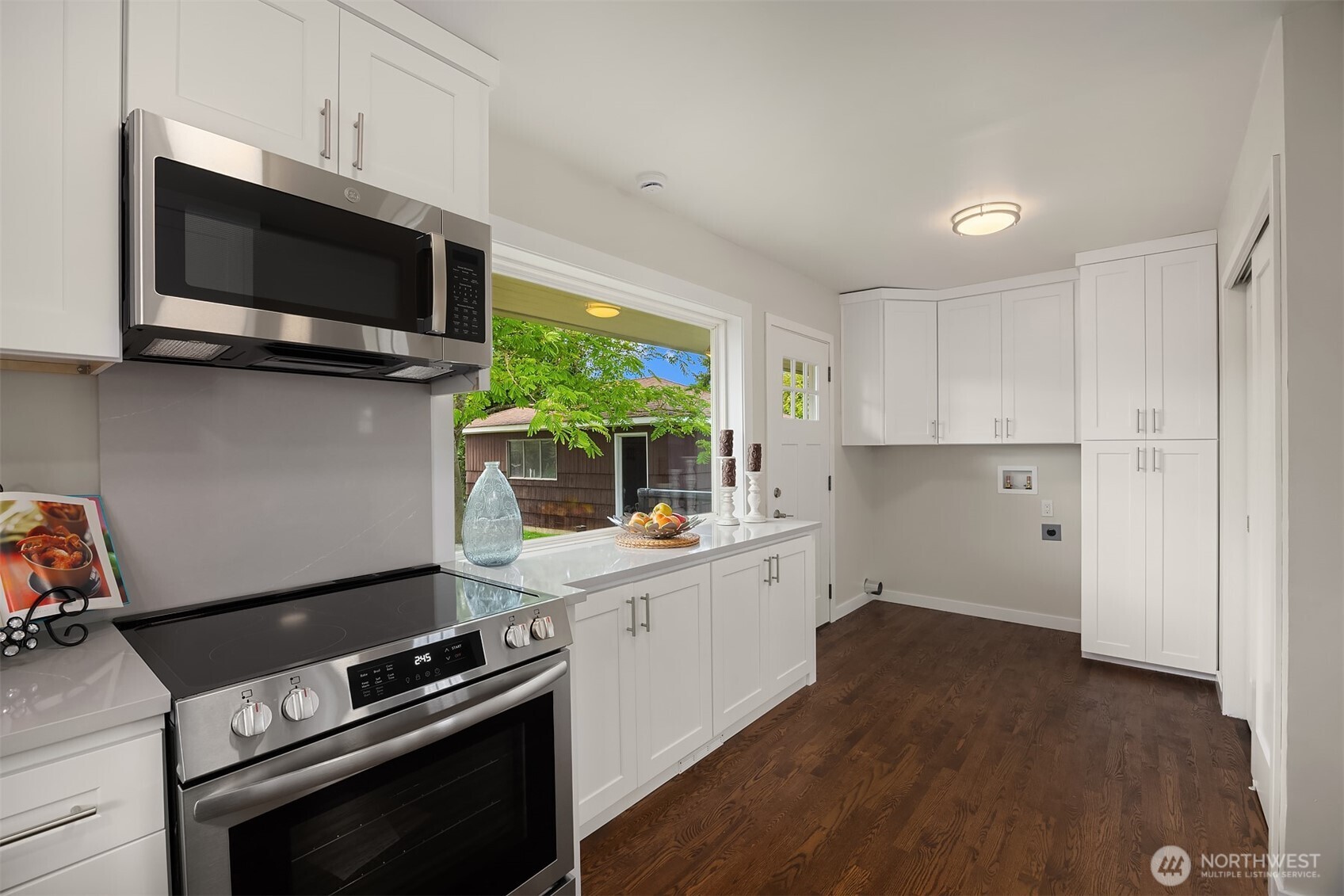Kitchen is brand new with new stove, microwave, and dishwasher installed.