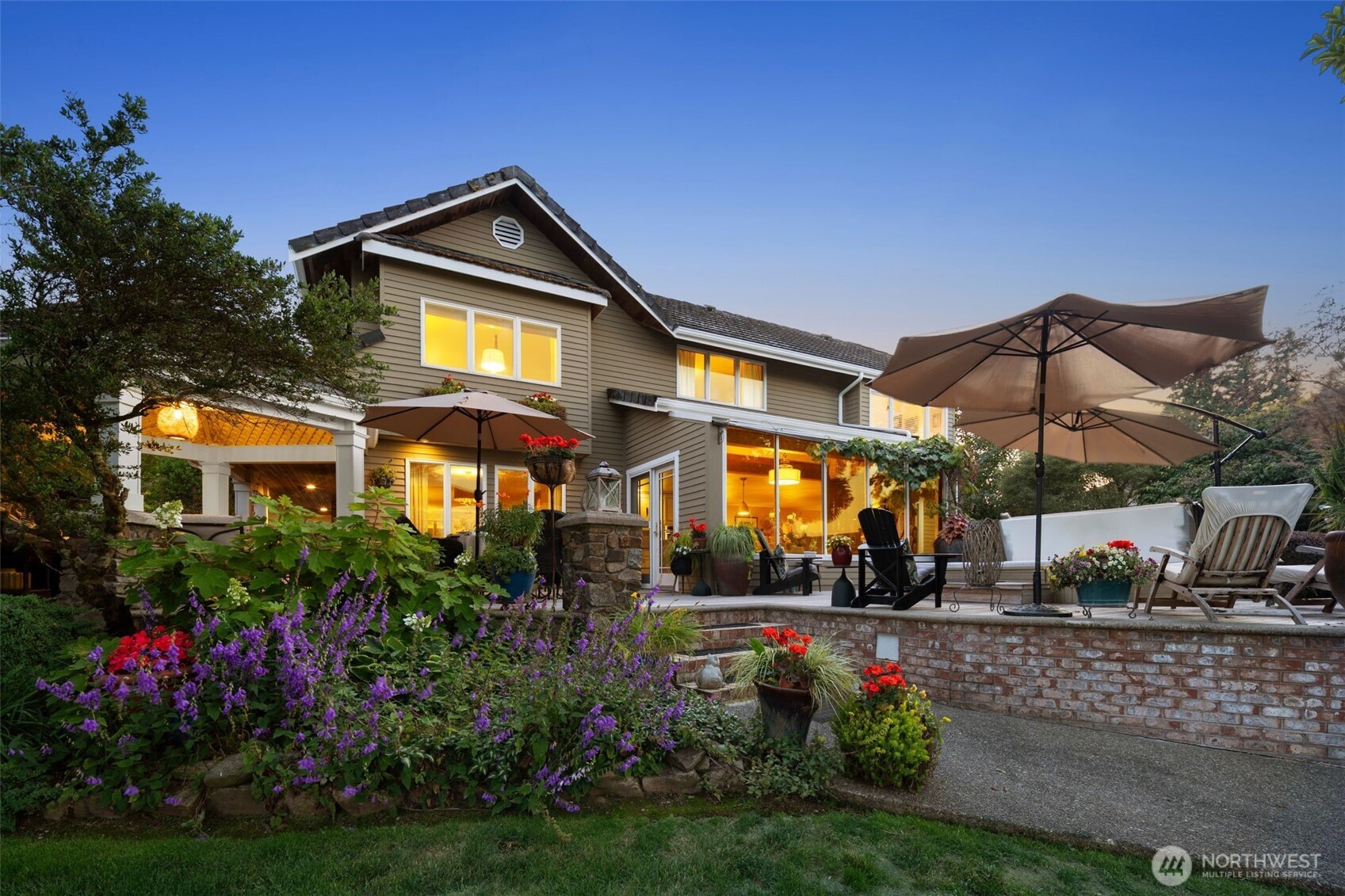 Beautifully landscaped, thoughtfully designed & planted for year round blooming enjoyment. This custom built residence evokes the charm & tranquility of the South of France.