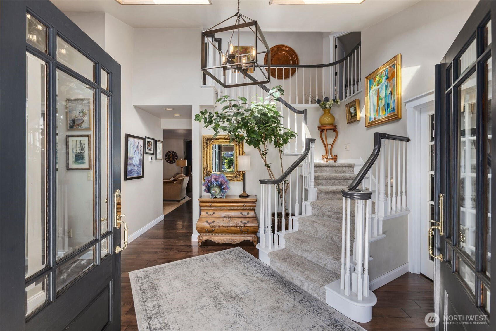 Custom-built residence w/grand entrance staircase w/soaring ceilings, a rare fusion of refinement & harmony.