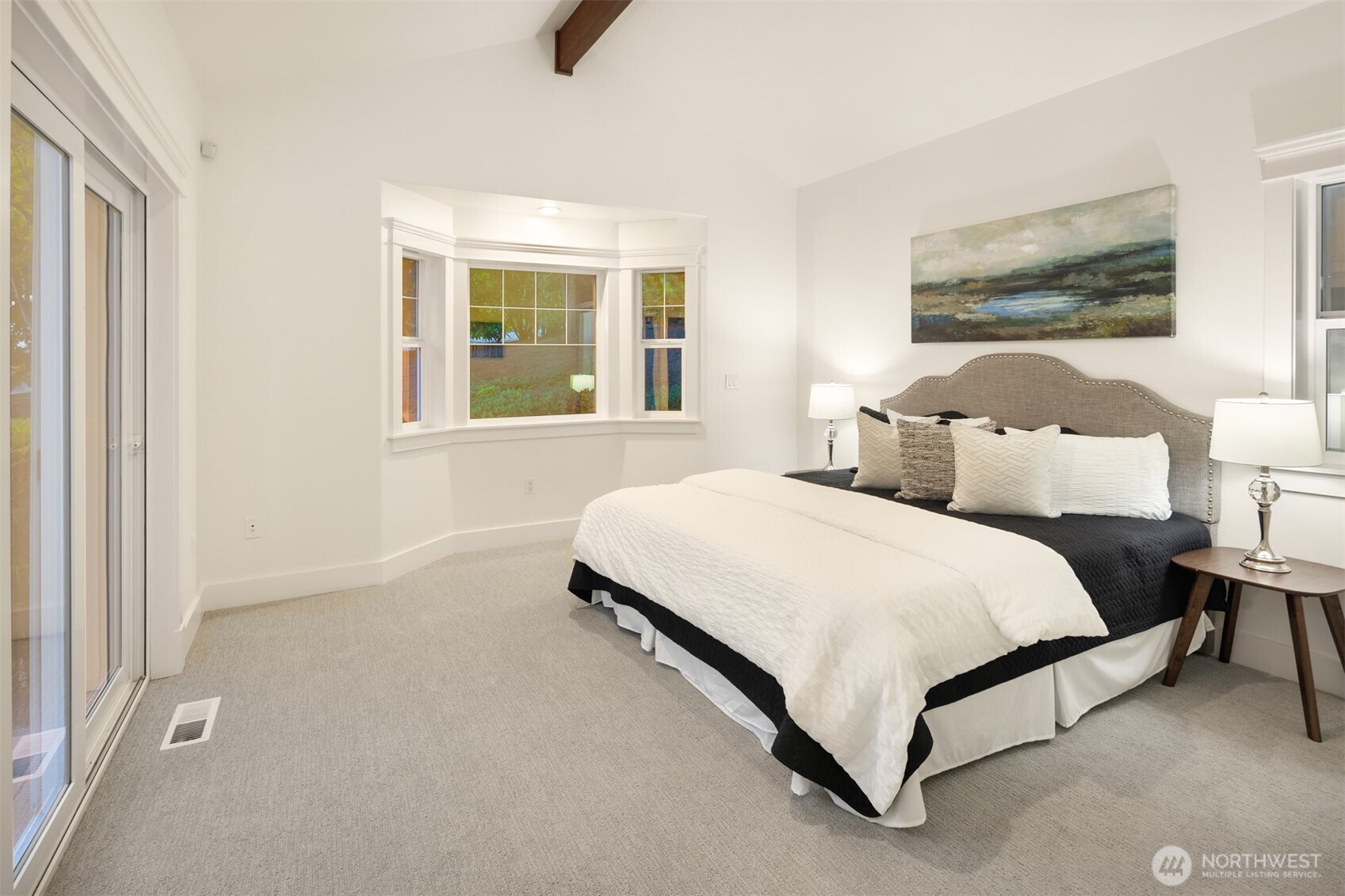 Primary suite on main. Brand new high end carpeting throughout.