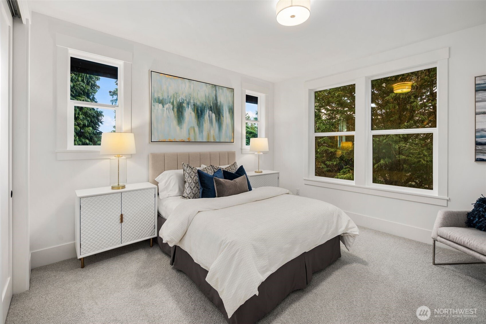 Secondary Bedroom w/ Mature Landscaping From Each Window. Custom Closet Package.