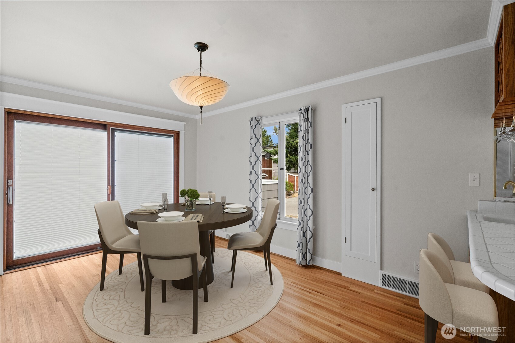 large dining room flows out to the oversized entertaining patio
