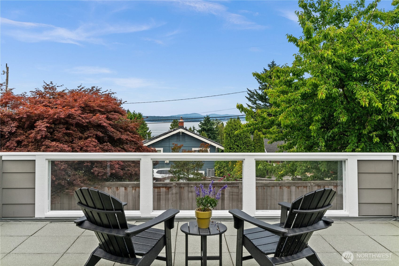 Patio with partial water & mountain views