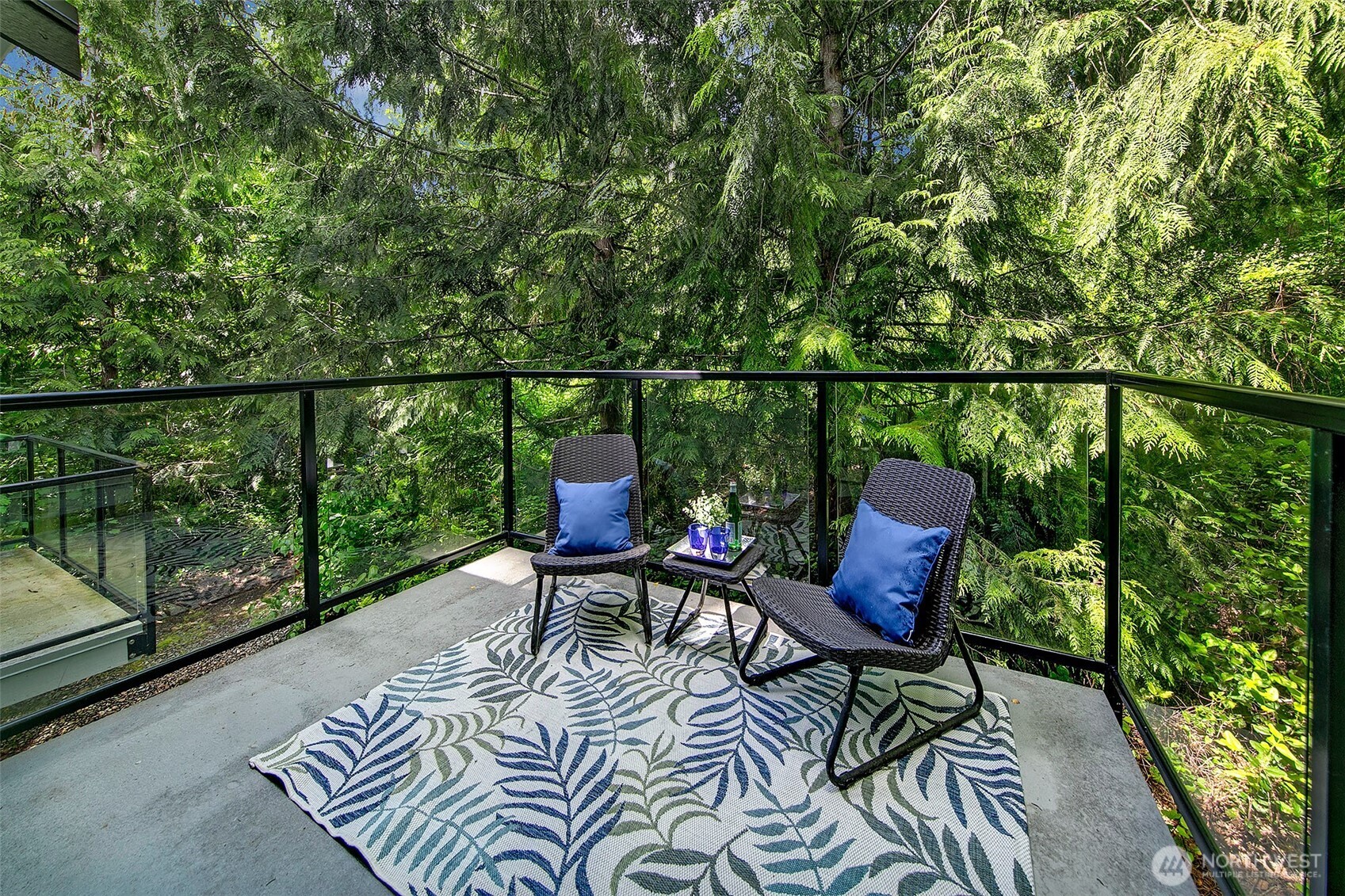 Spacious deck off living room from sliding doors; a great expansion of living space in the summer months.