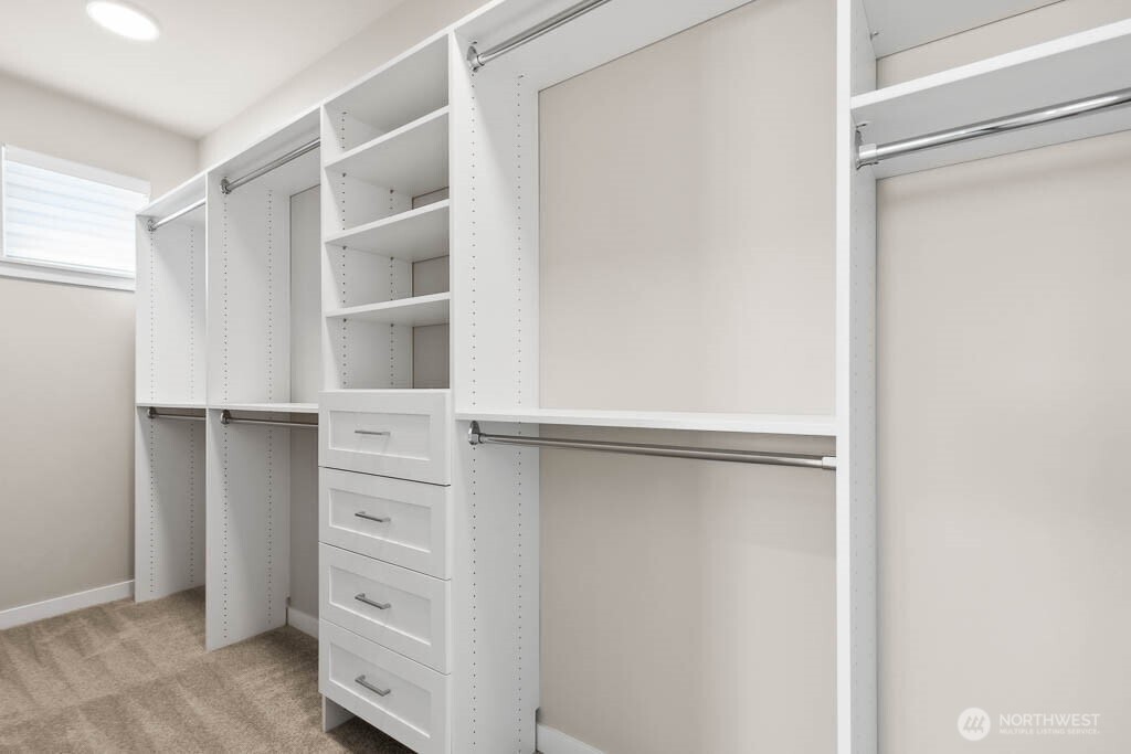 Large closet system included in primary walk in closet!