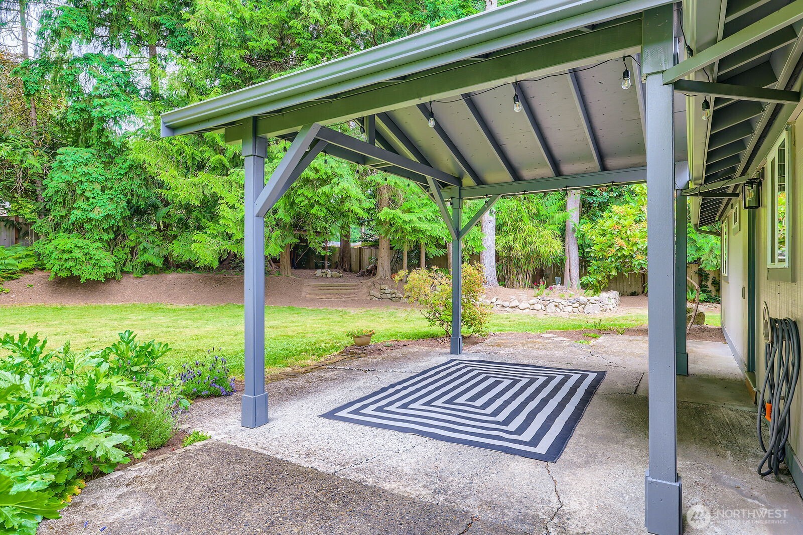 Mature landscaping frames the home.