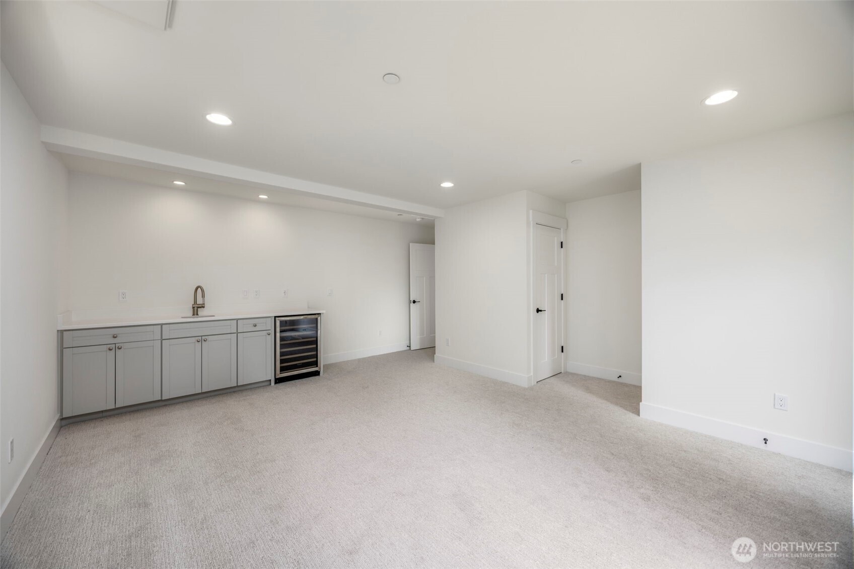 Complete with kitchenette. Use for guests, renters, or as a rec-room!