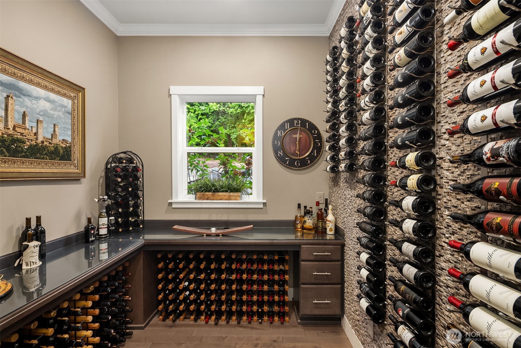 The wine room with a custom built "wine-wall" is a must for the wine enthusiast!