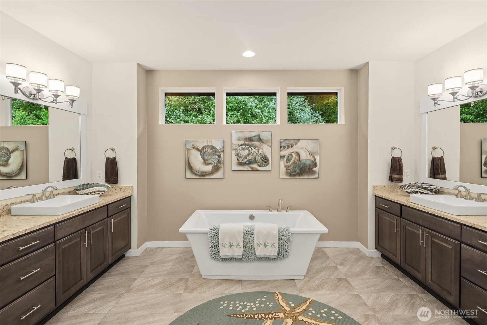 The spa-like primary bathroom is the ultimate in luxury!
