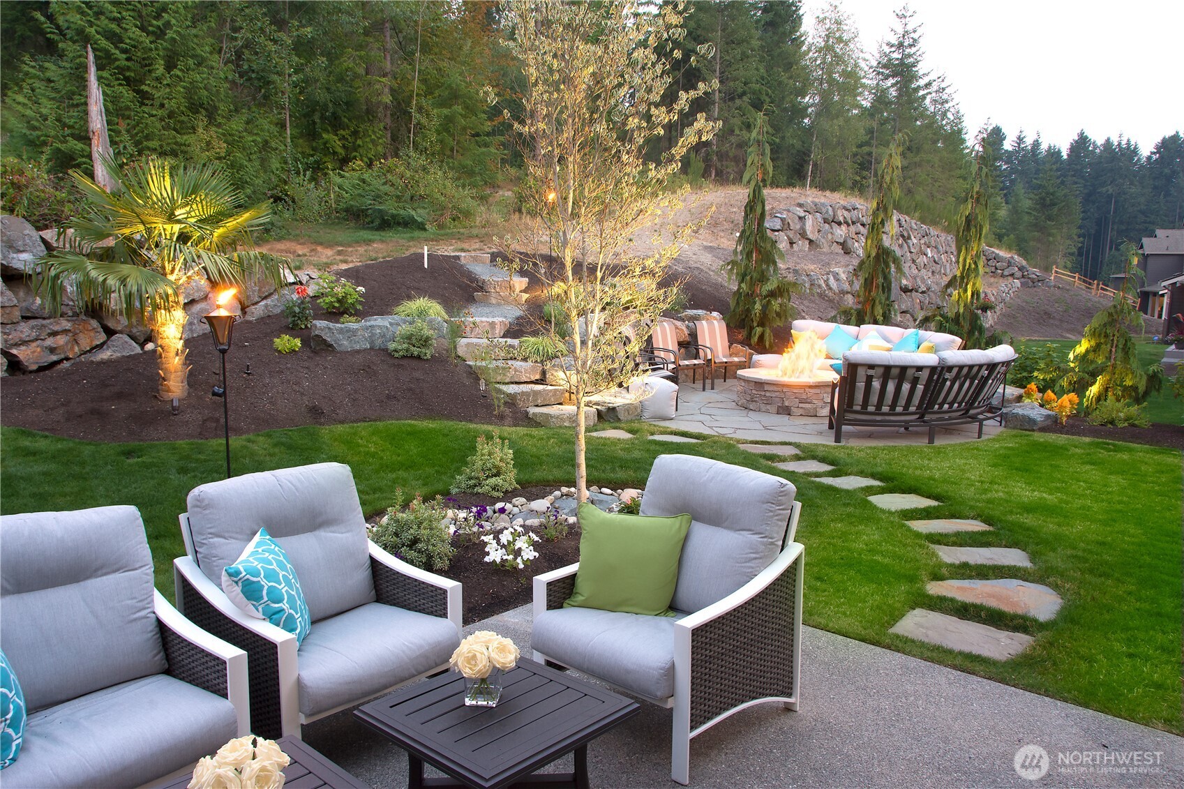 The lighting and landscaping accentuate the beauty of this space.