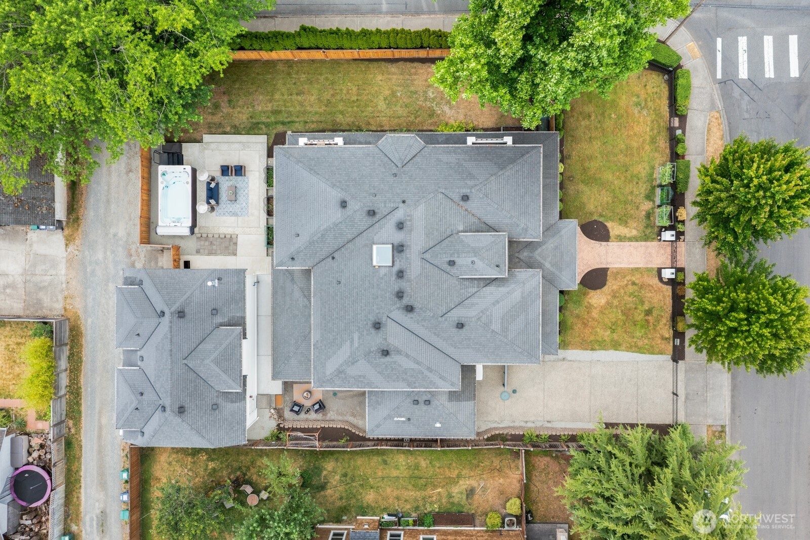 Seated on a 1/4 acre corner lot, the house has so many outdoor spaces!!