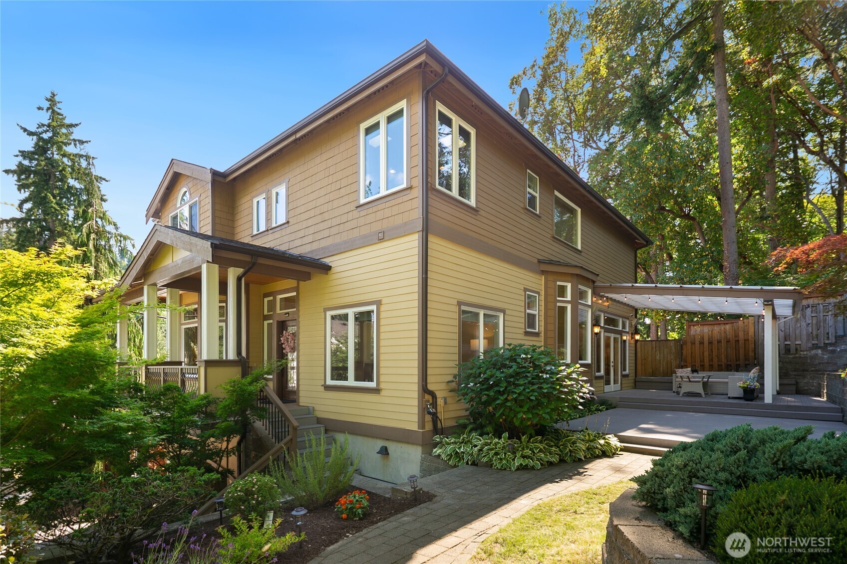 Expansive covered front porch and Trex deck, beautiful terraced gardens with paved walkways, a large designated workshop, and a four-car driveway. Central A/C, UV filtration for improved indoor air quality, and generator-ready. This home is in immaculate condition!