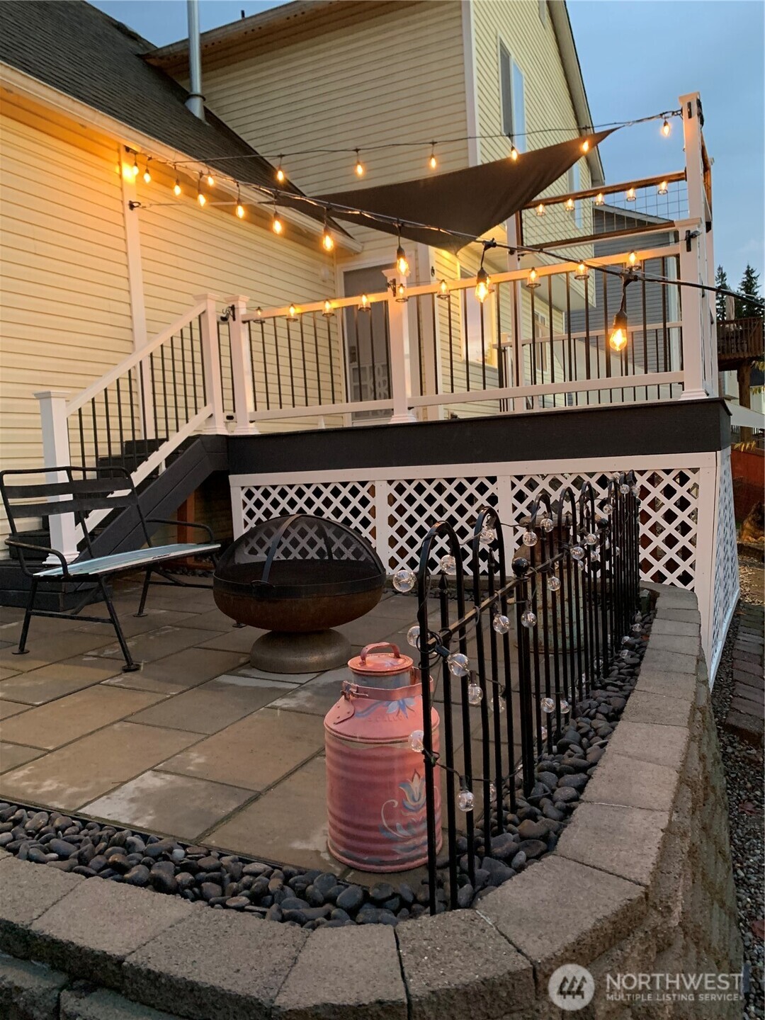 An eveing view shot of the patio & deck areas.