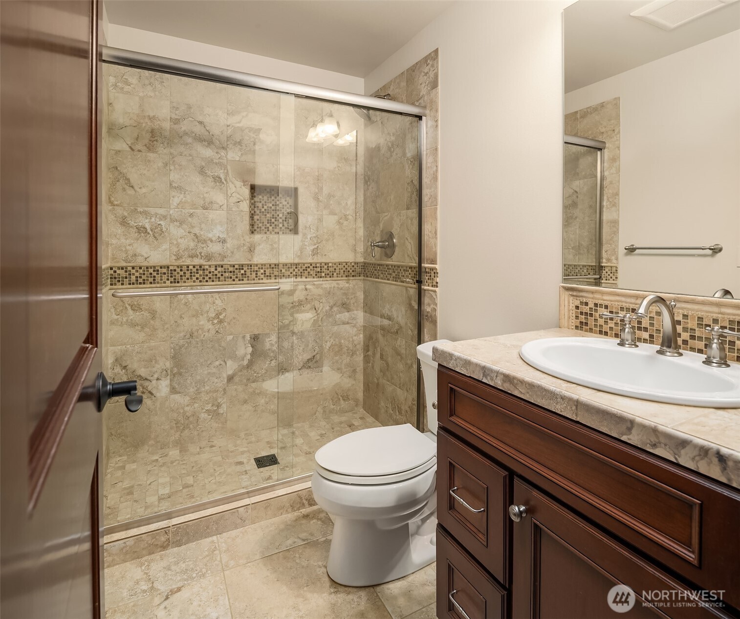 Main floor guest suite offers an ensuite bathroom