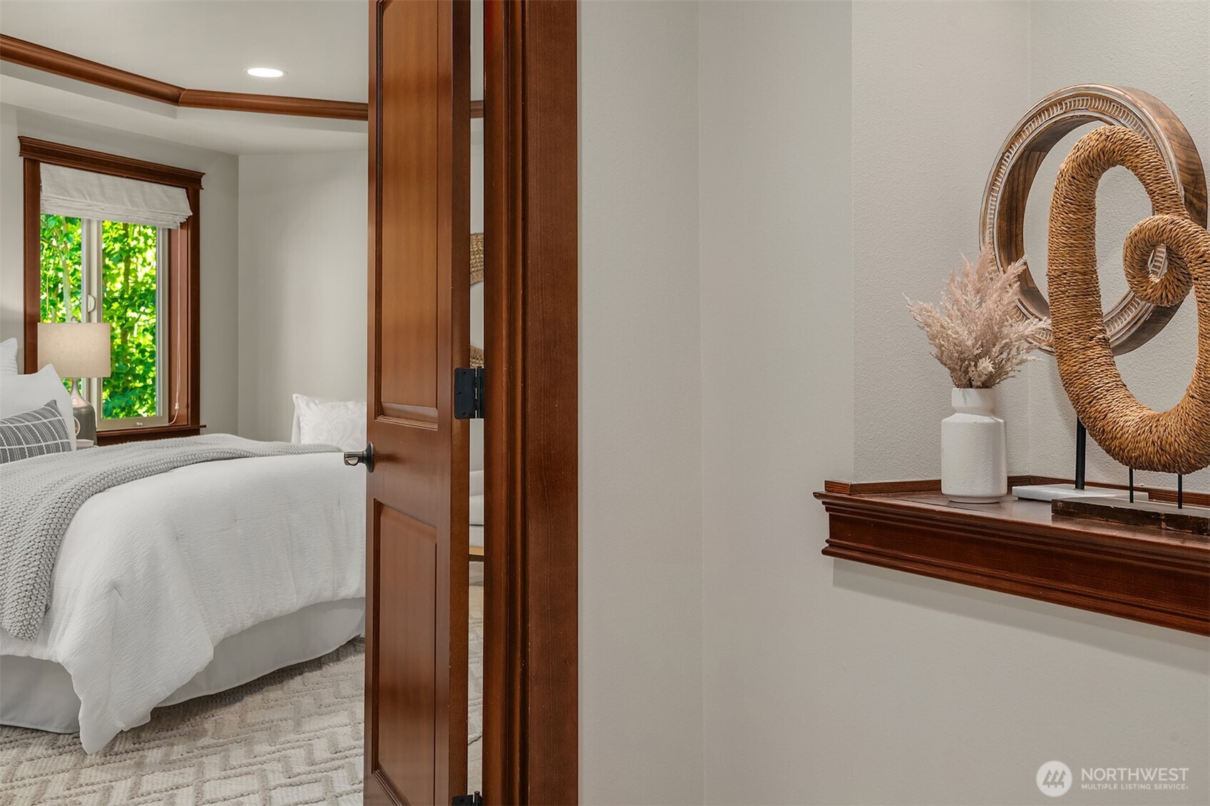 Primary Suite Bath with corner tub and custom walk-in shower.